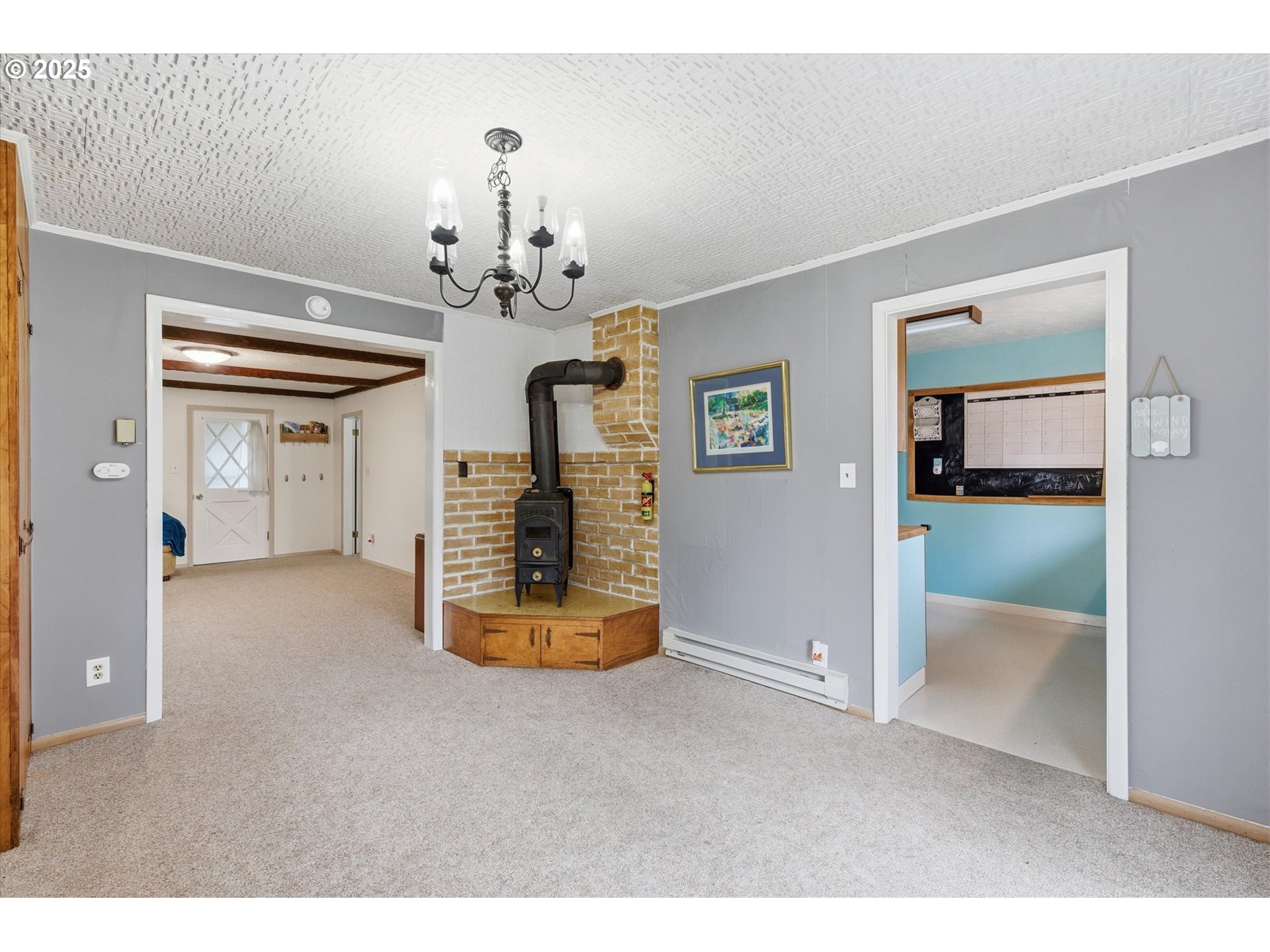 4514 L Place Seaview, WA 98644 - Photo 8 of 47 a view of a livingroom with a chandelier