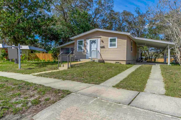 front view of a house and a yard