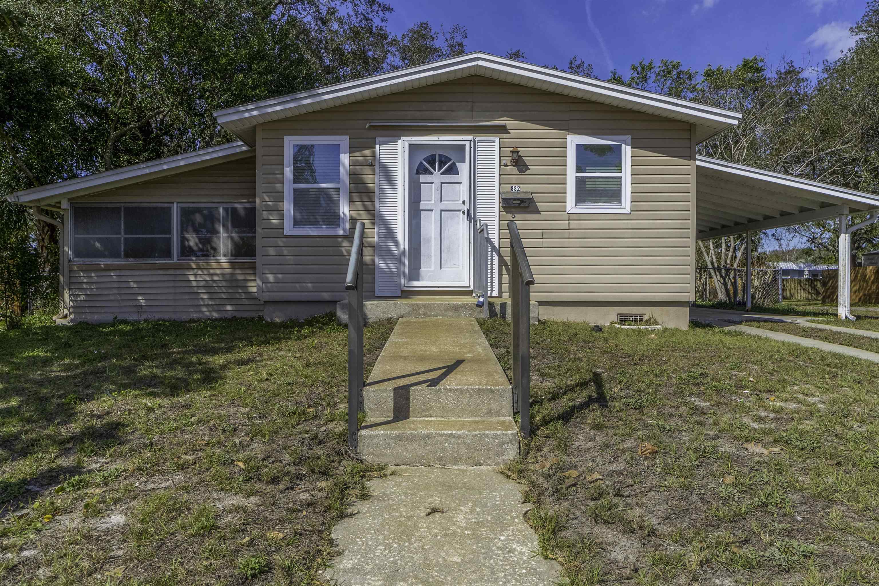 882 Palermo Road St. Augustine, FL 32086 - Photo 26 of 26 a view of a house with a yard