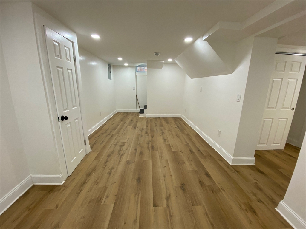 31 Freeman Terrace Springfield, MA 01104 - Photo 21 of 28 a view of a hallway with wooden floor