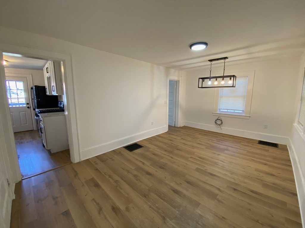 31 Freeman Terrace Springfield, MA 01104 - Photo 3 of 28 a view of empty room with wooden floor