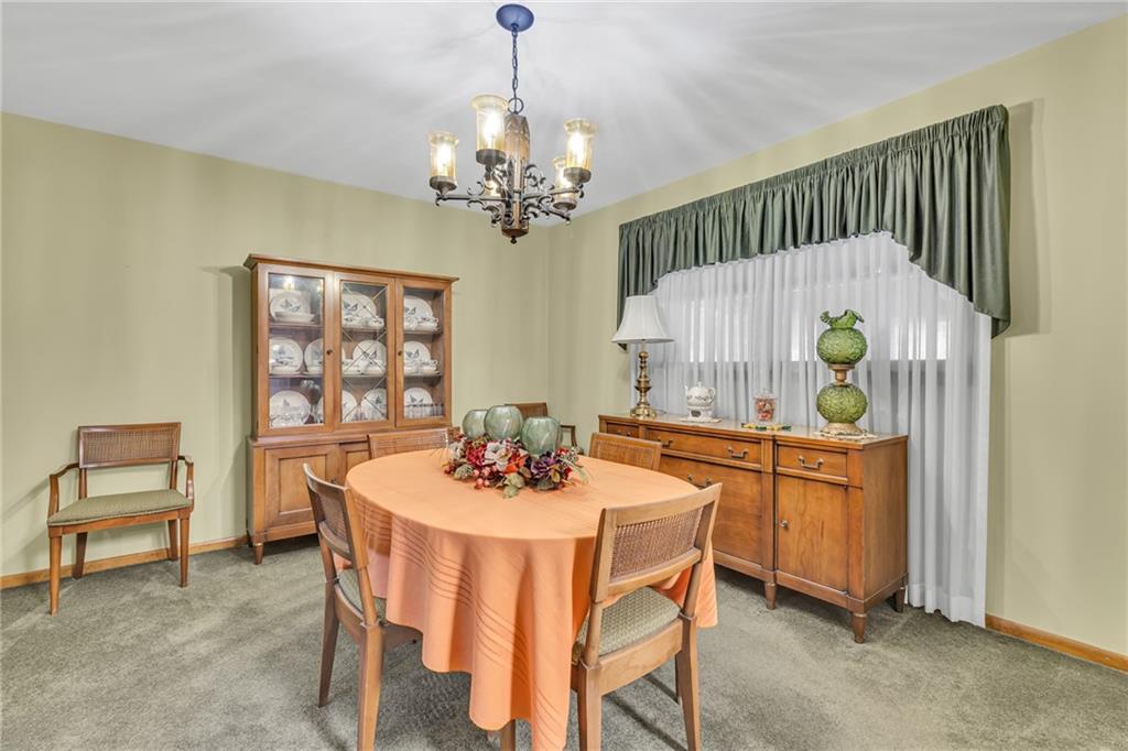 610 Davidson Drive Rochester, PA 15074 - Photo 12 of 30 a dining room with furniture a chandelier and window