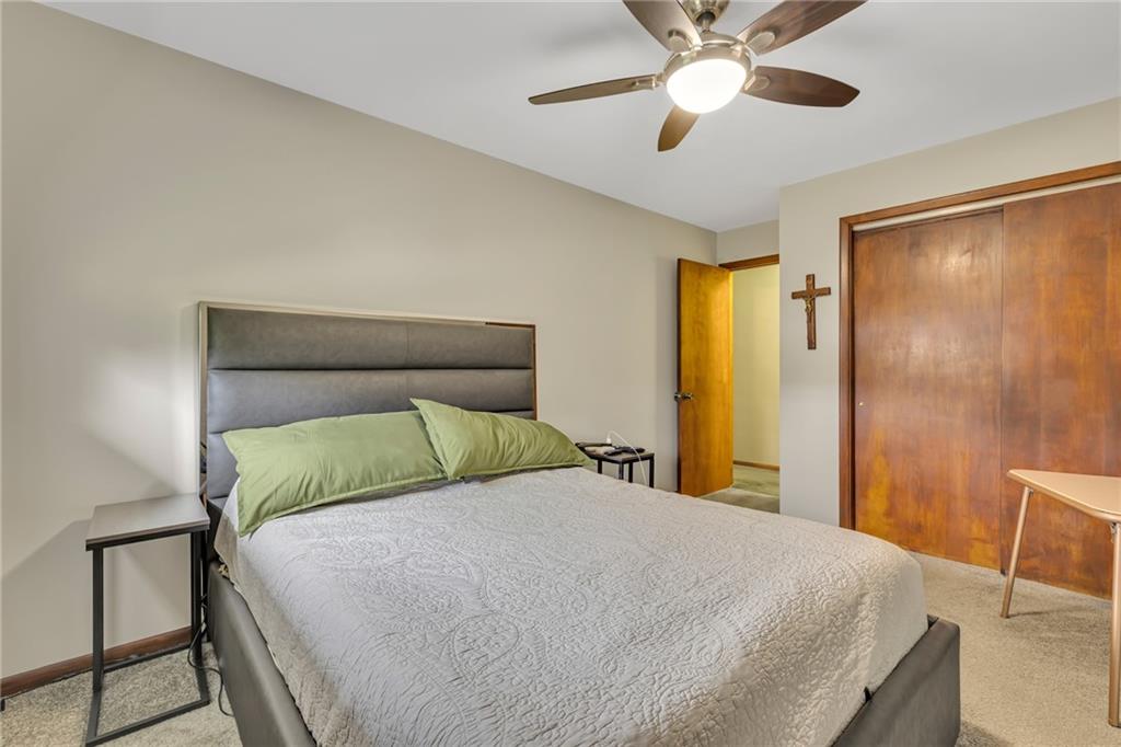610 Davidson Drive Rochester, PA 15074 - Photo 15 of 30 a bedroom with a bed and a chandelier