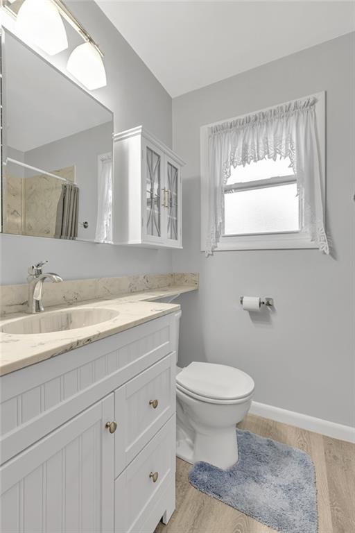 610 Davidson Drive Rochester, PA 15074 - Photo 18 of 30 a bathroom with a granite countertop toilet sink and mirror