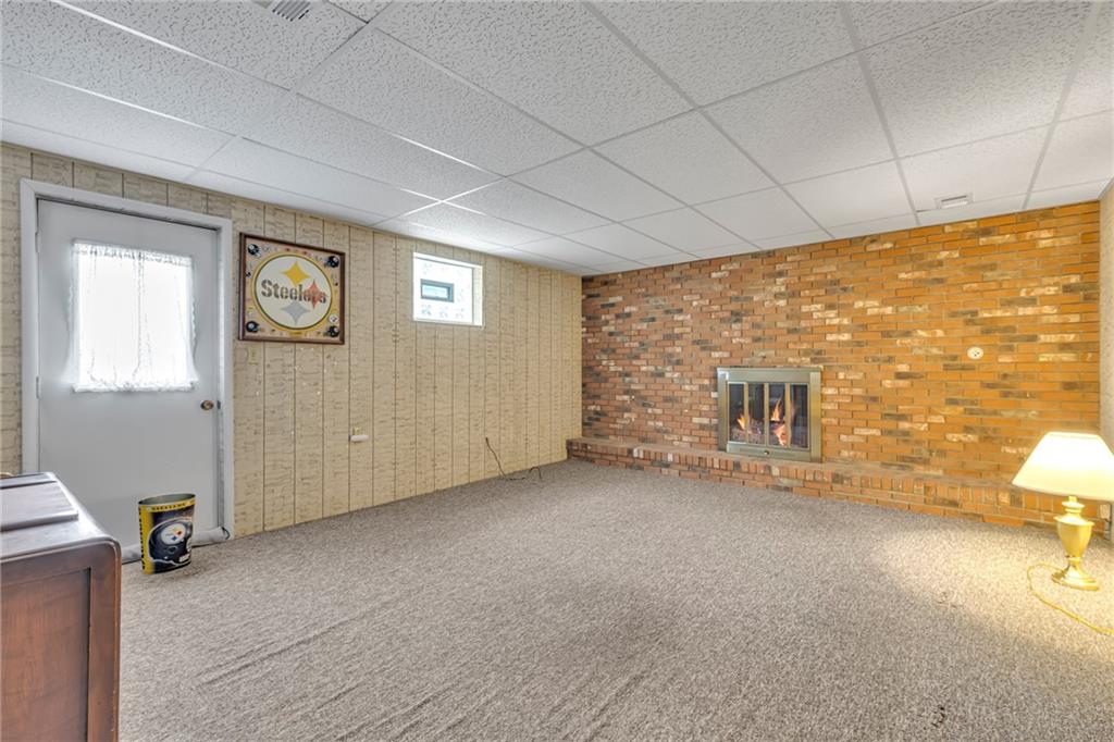 610 Davidson Drive Rochester, PA 15074 - Photo 22 of 30 a view of an empty room with a fireplace