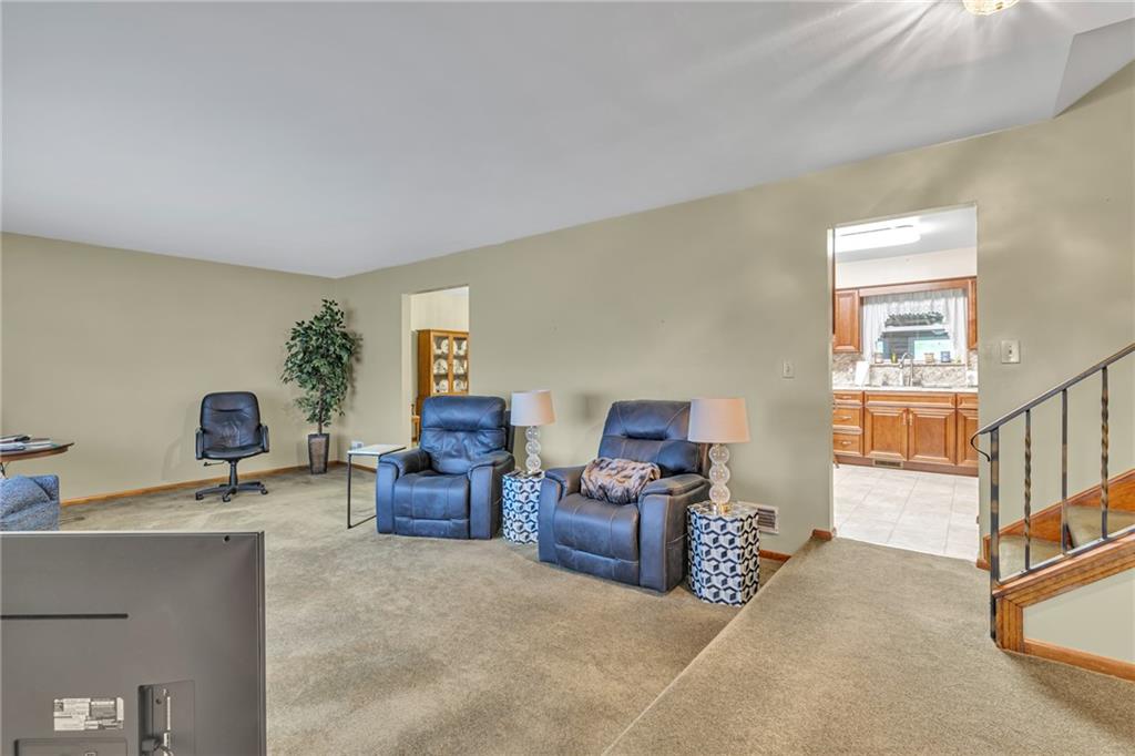 610 Davidson Drive Rochester, PA 15074 - Photo 7 of 30 a living room with furniture and a flat screen tv