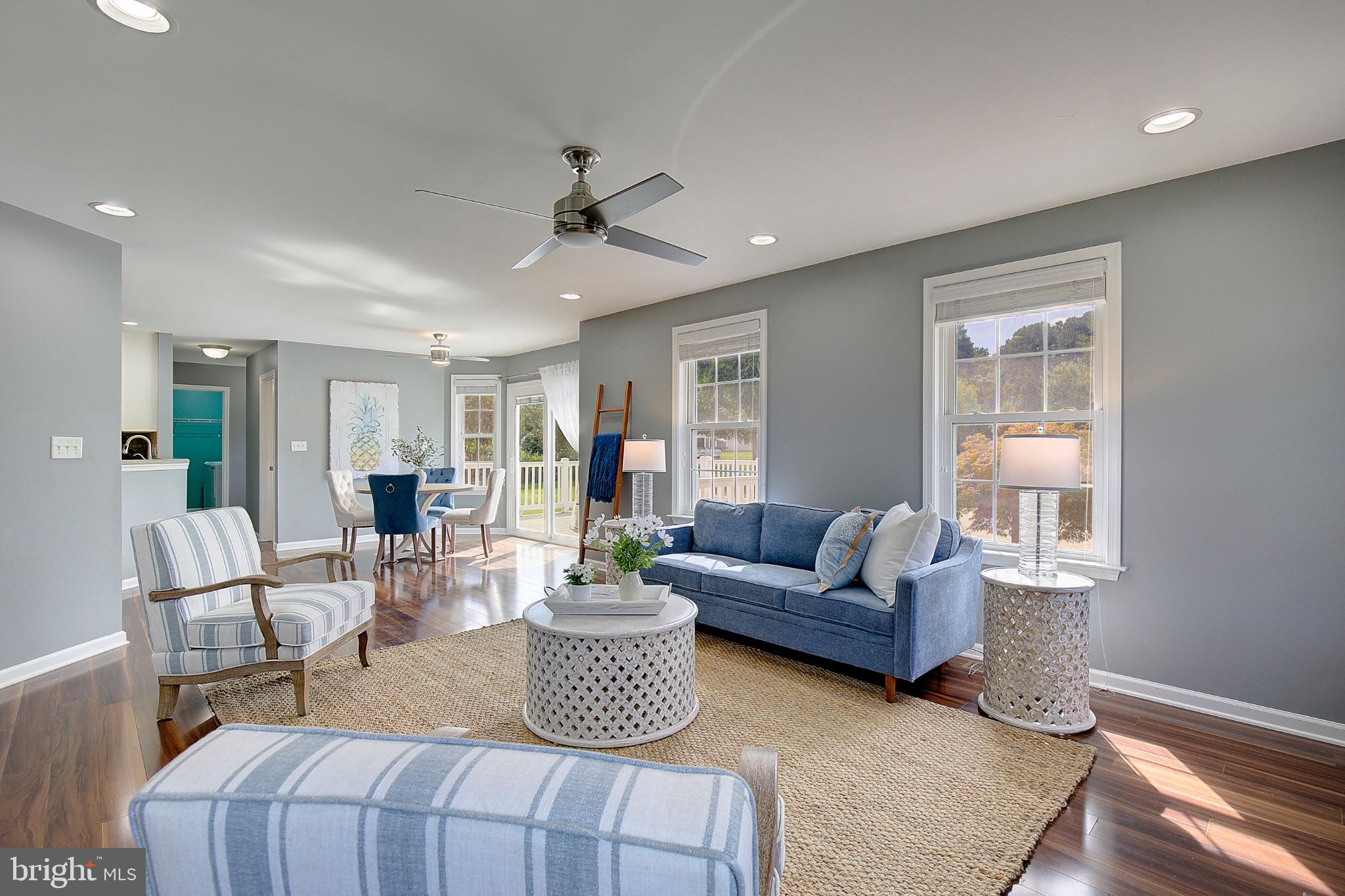 123 Bentons Pleasure Road Chester, MD 21619 - Photo 14 of 63 a living room with furniture and a window