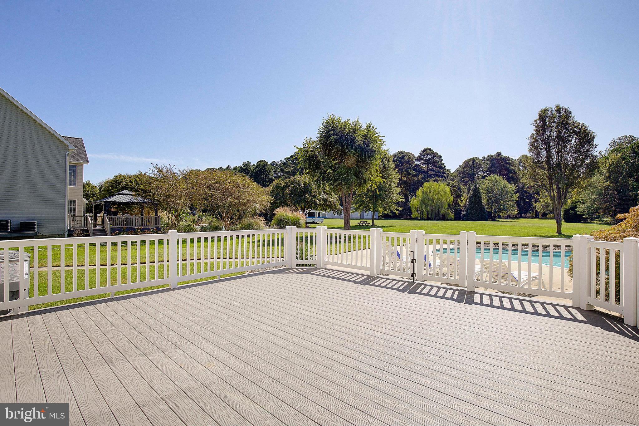 123 Bentons Pleasure Road Chester, MD 21619 - Photo 56 of 63 Sunny deck overlooking pool