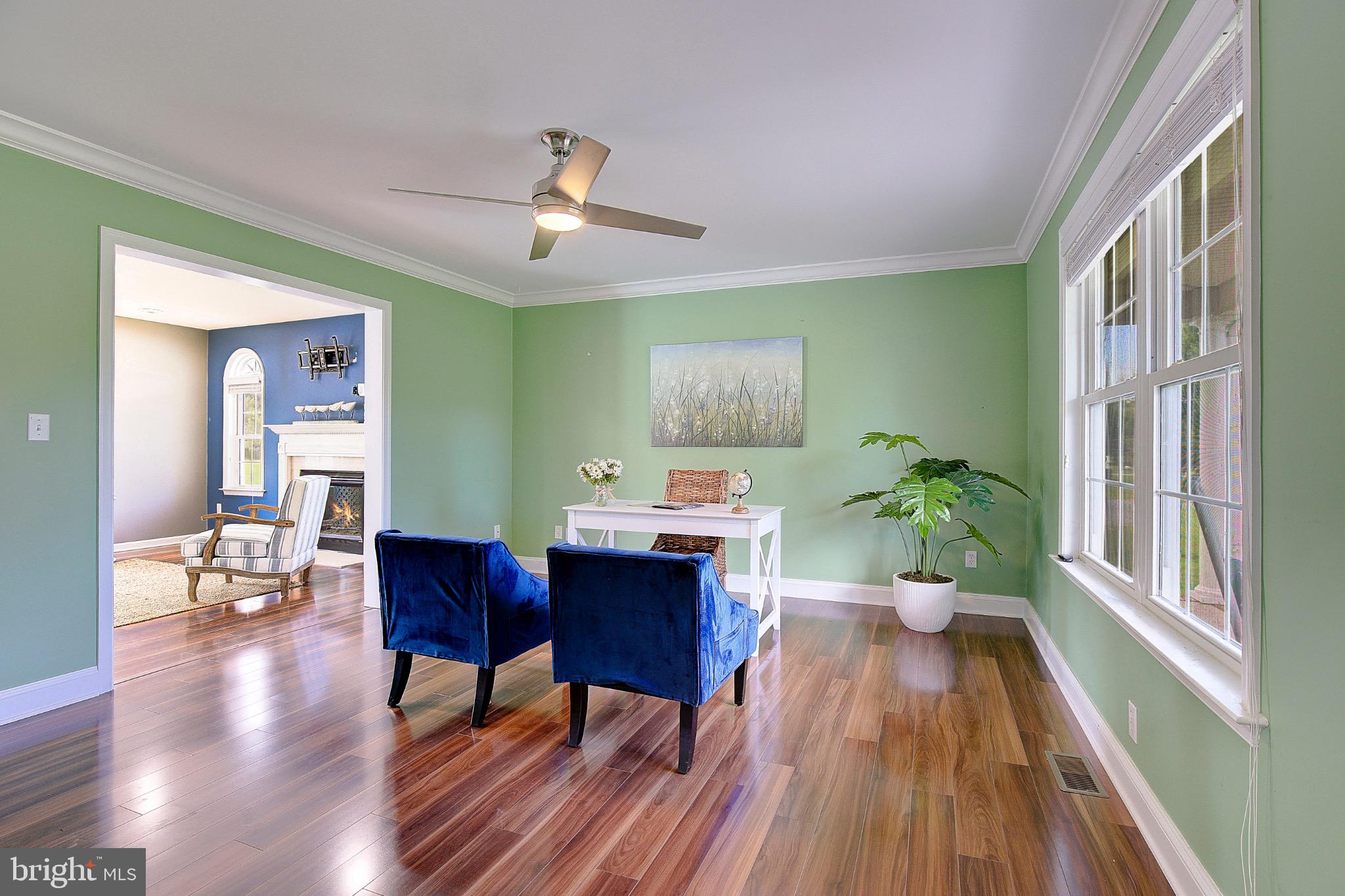 123 Bentons Pleasure Road Chester, MD 21619 - Photo 8 of 63 a view of a dining room with furniture window and wooden floor