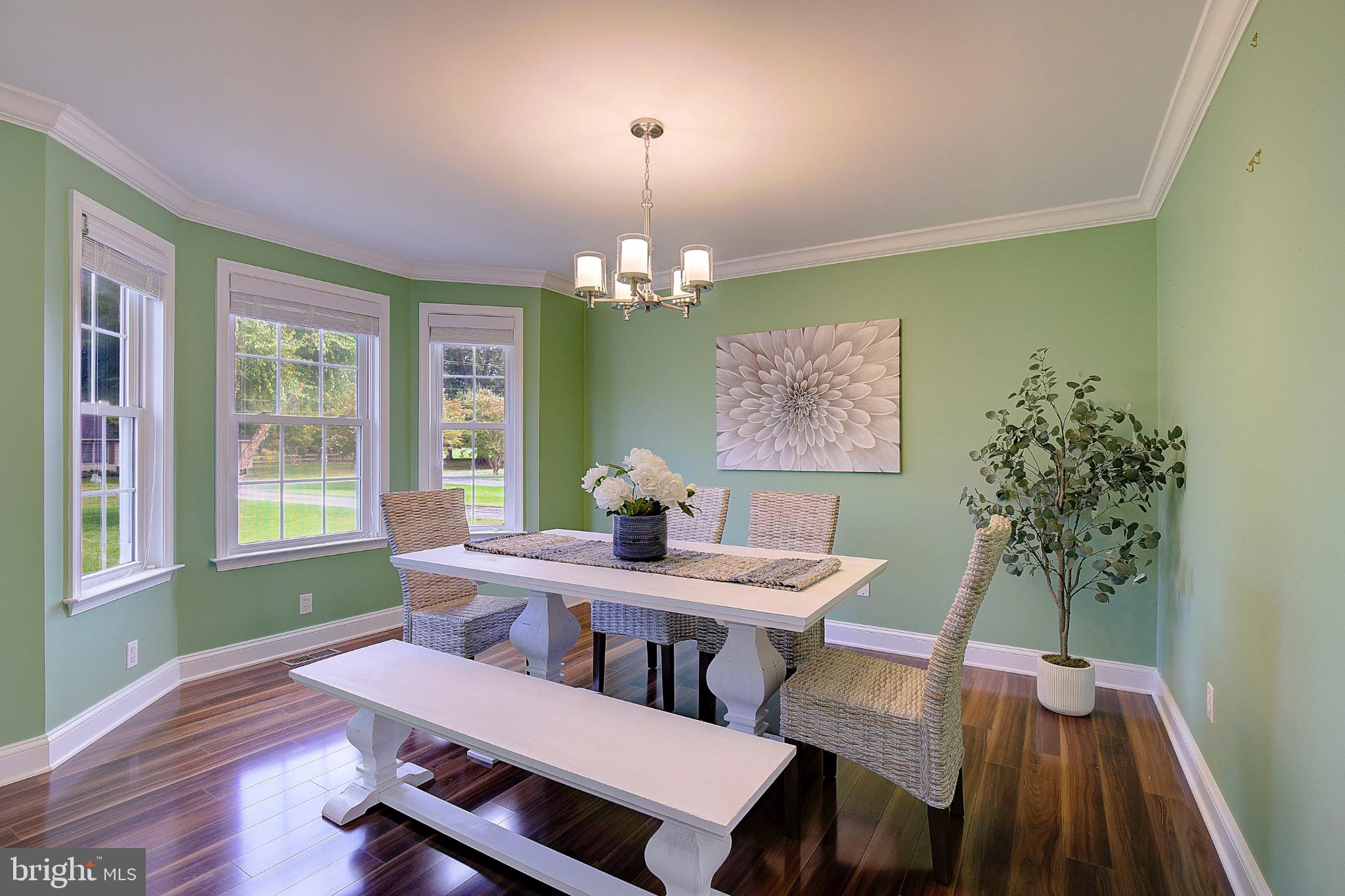 123 Bentons Pleasure Road Chester, MD 21619 - Photo 10 of 63 a view of a dining room with furniture window and outside view