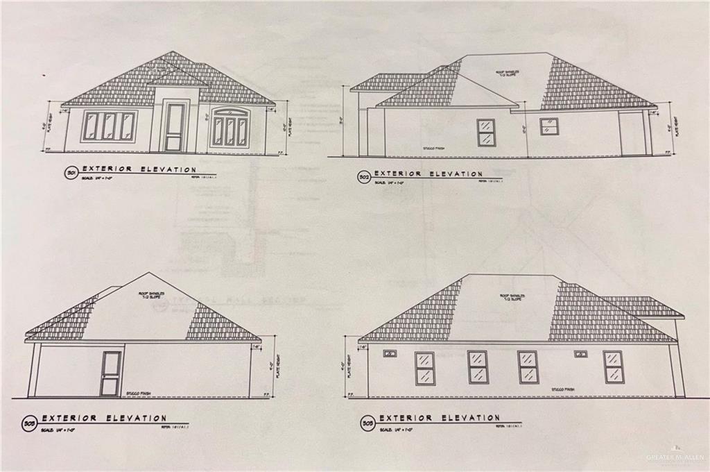 a view of a house with a wall