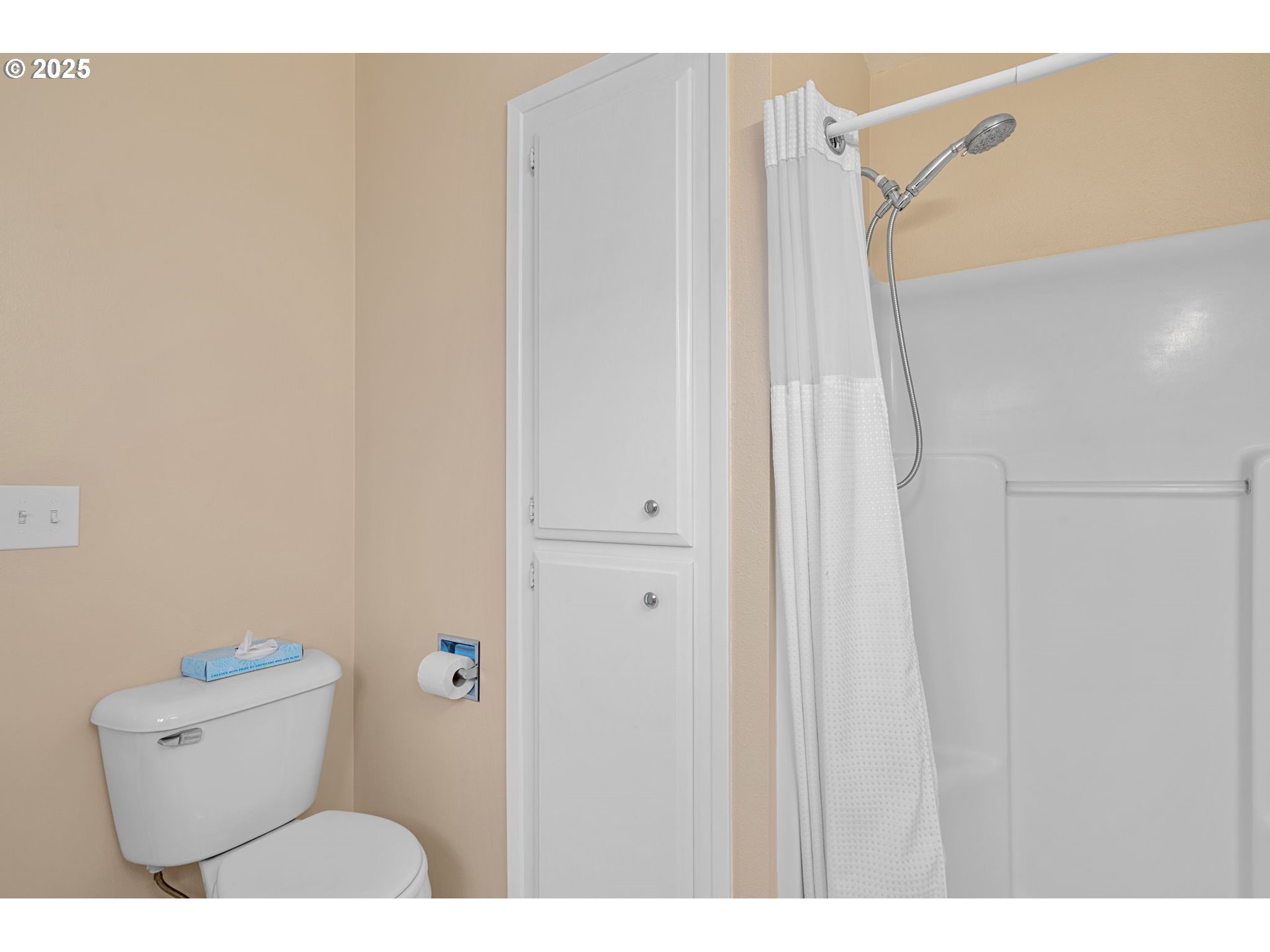 15390 Southwest Davis Road Beaverton, OR 97007 - Photo 27 of 46 a bathroom with a toilet and a shower