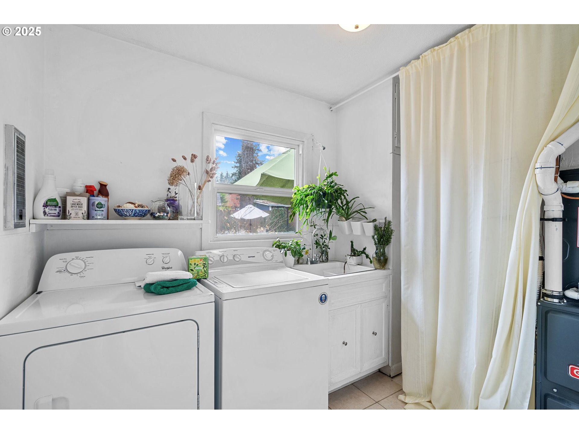 15390 Southwest Davis Road Beaverton, OR 97007 - Photo 32 of 46 a utility room with dryer and washer