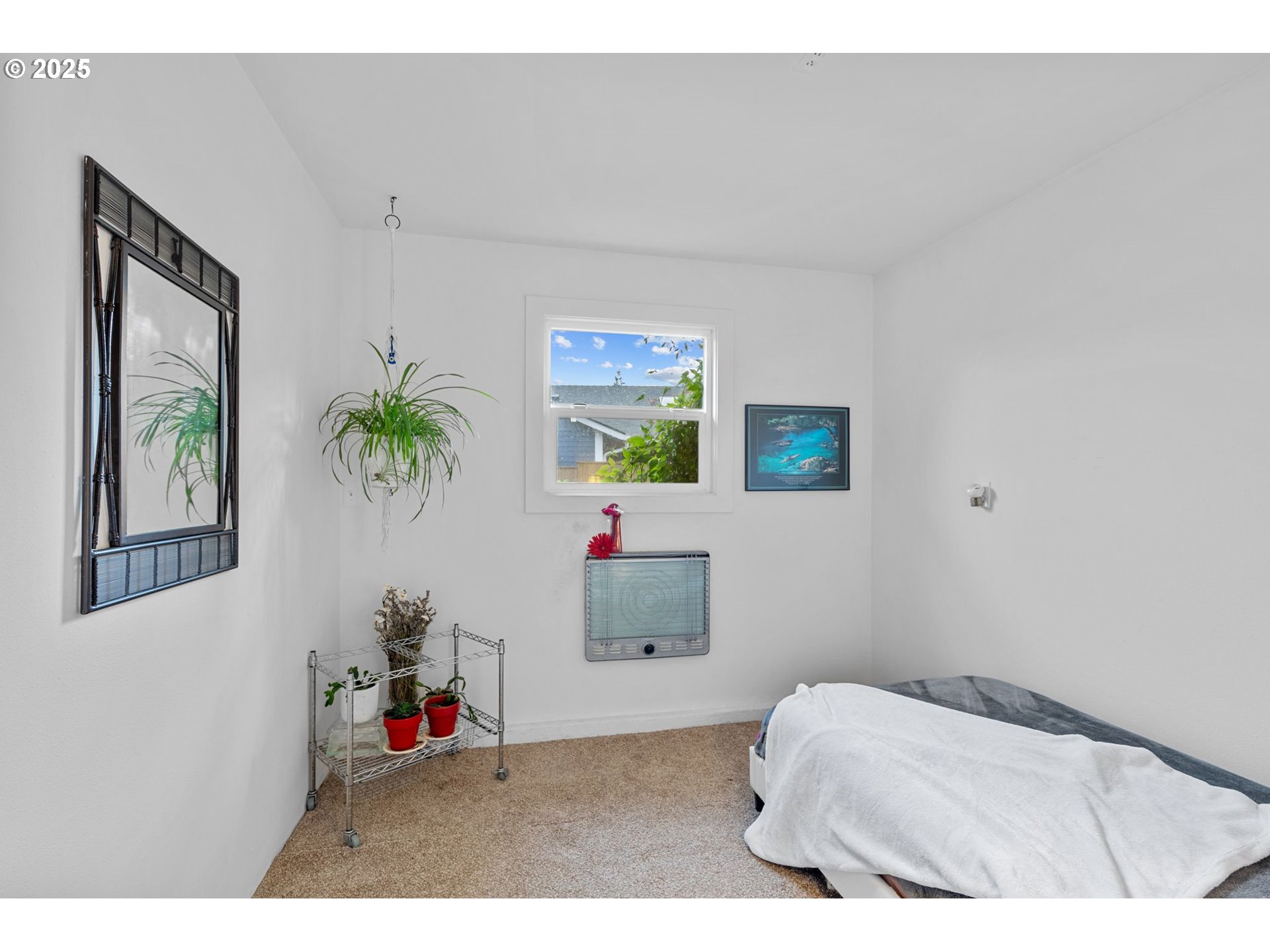 15390 Southwest Davis Road Beaverton, OR 97007 - Photo 34 of 46 a bedroom with a bed and a couch