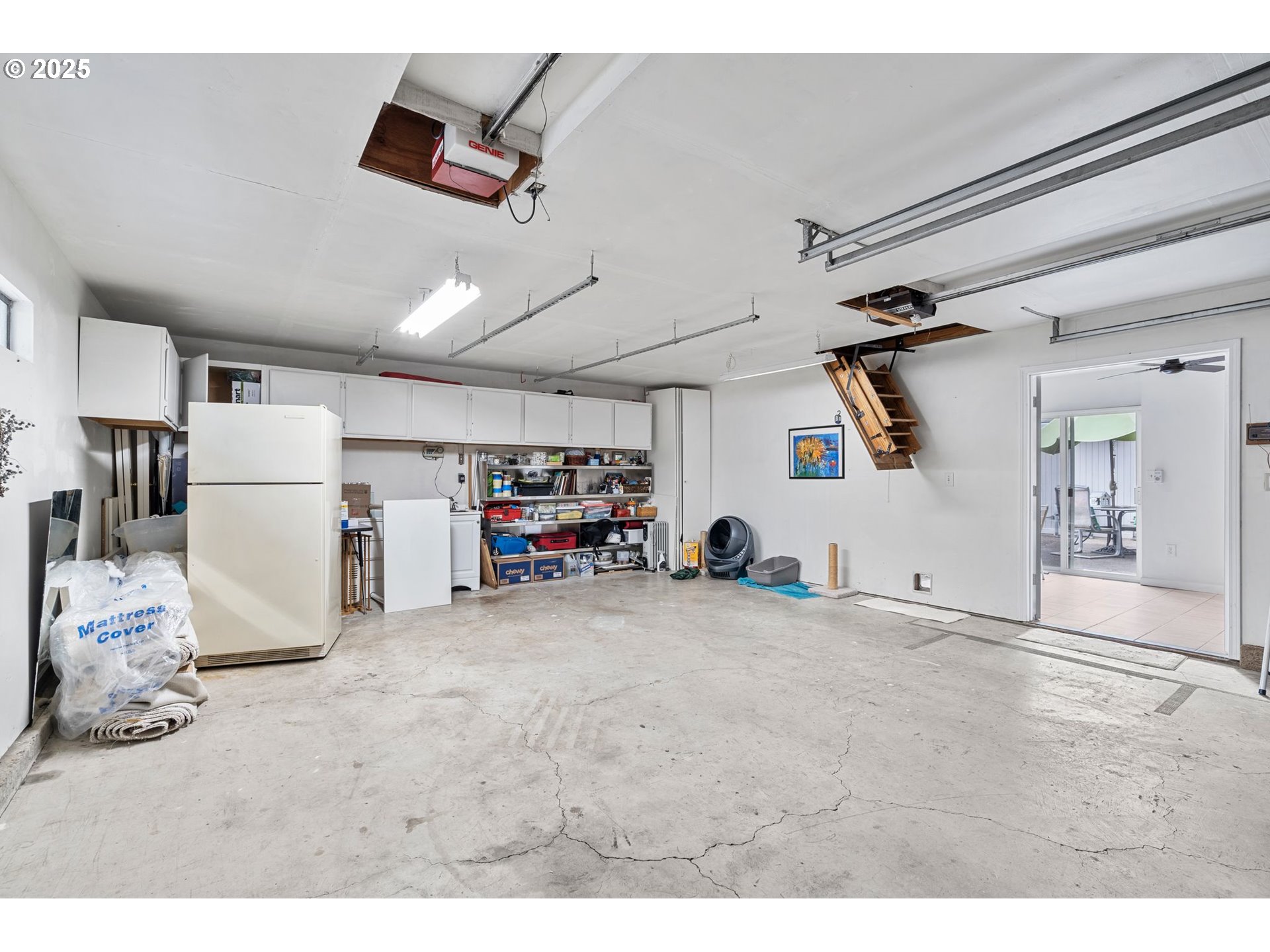 15390 Southwest Davis Road Beaverton, OR 97007 - Photo 37 of 46 a view of a livingroom with furniture and a ceiling fan