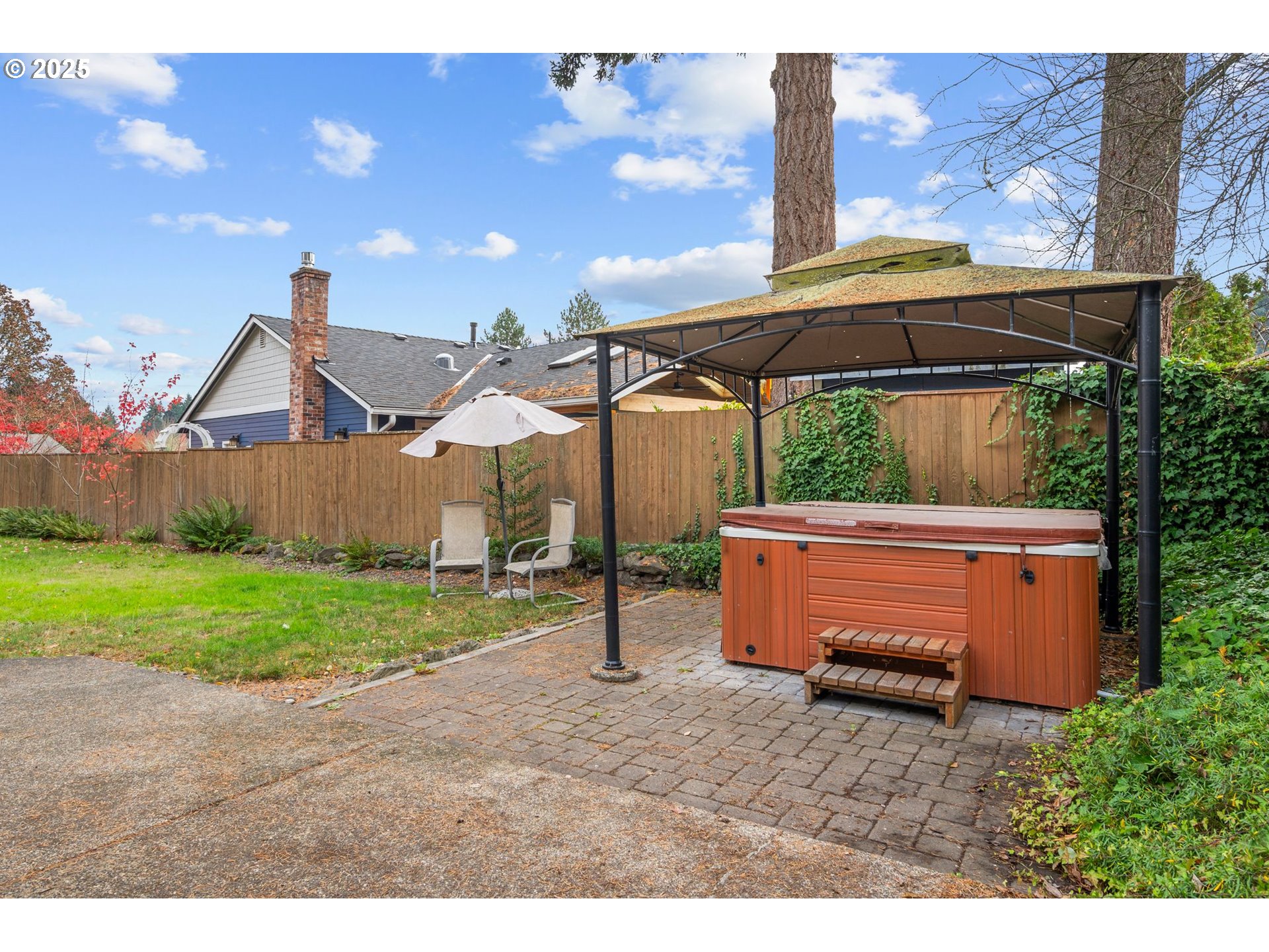 15390 Southwest Davis Road Beaverton, OR 97007 - Photo 40 of 46 a house view with a backyard space