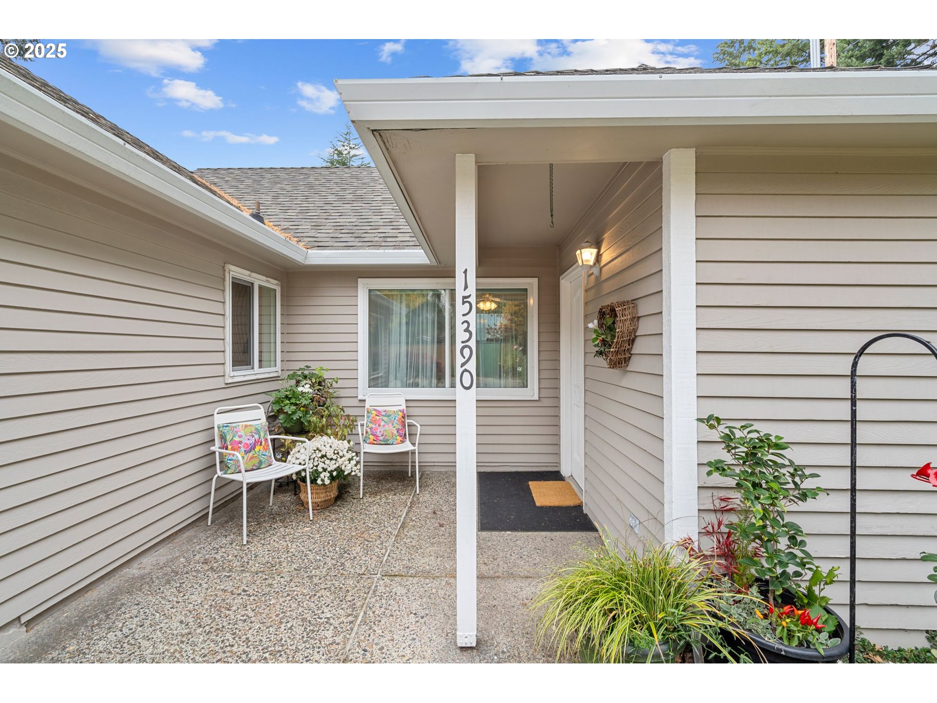 15390 Southwest Davis Road Beaverton, OR 97007 - Photo 4 of 46 a backyard of a house with outdoor seating