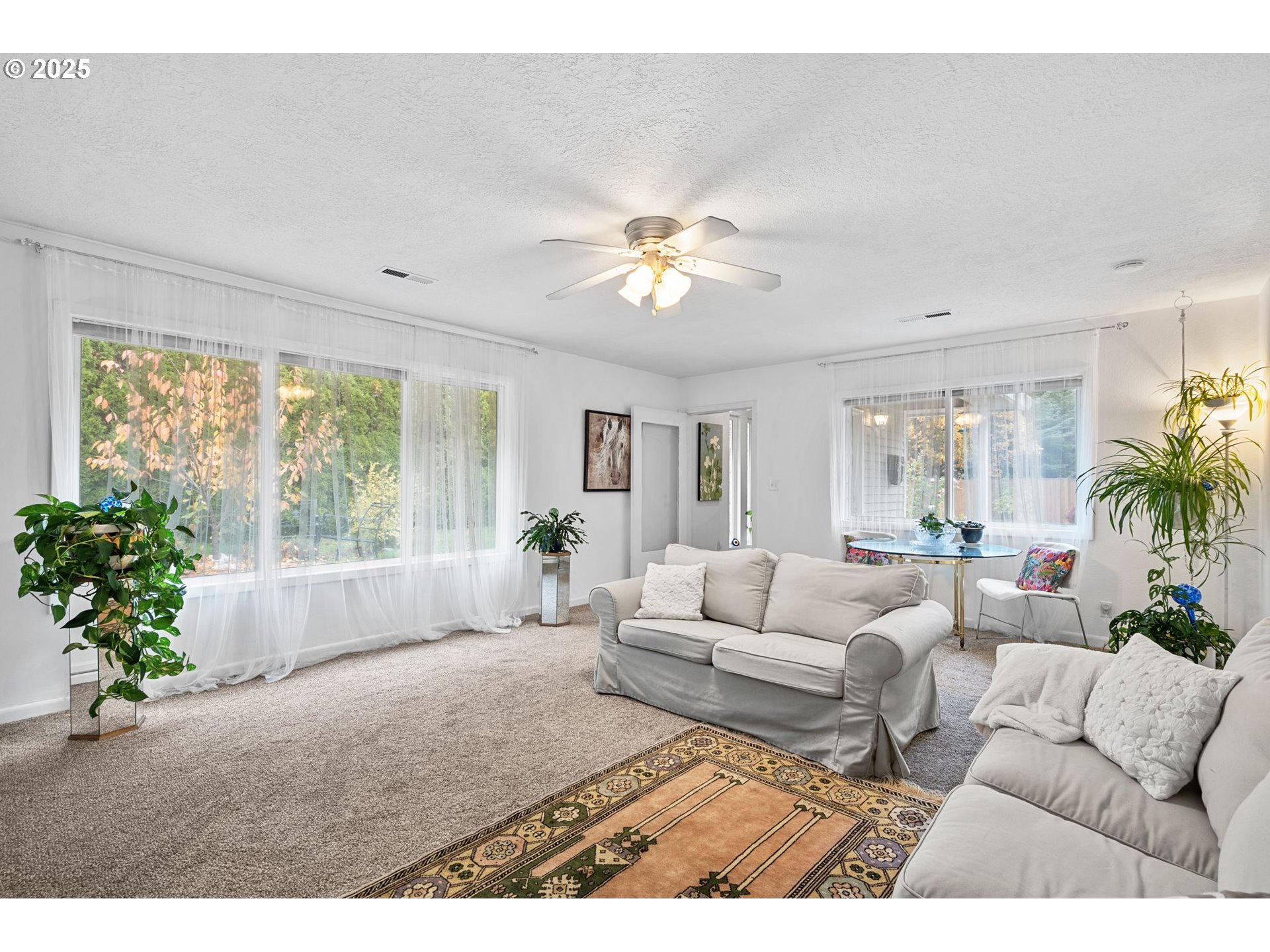 15390 Southwest Davis Road Beaverton, OR 97007 - Photo 8 of 46 a living room with furniture and a large window