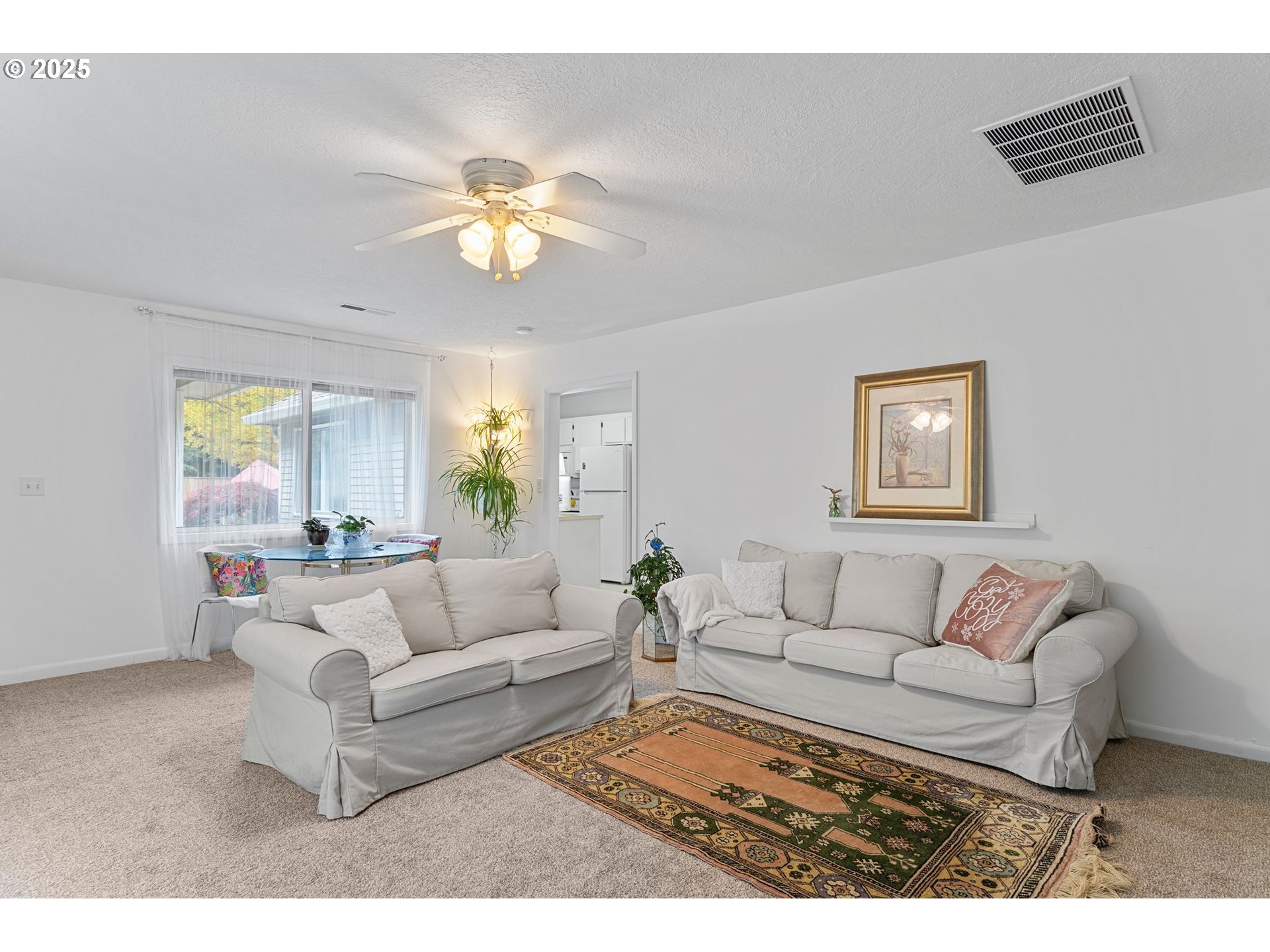 15390 Southwest Davis Road Beaverton, OR 97007 - Photo 9 of 46 a living room with furniture and a window