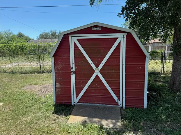 a view of a balcony with wooden floor