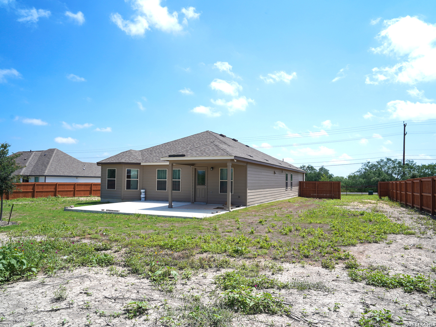 20929 Pleasanton Road San Antonio, TX 78264 - Photo 4 of 51 a view of a house with a yard and potted plants