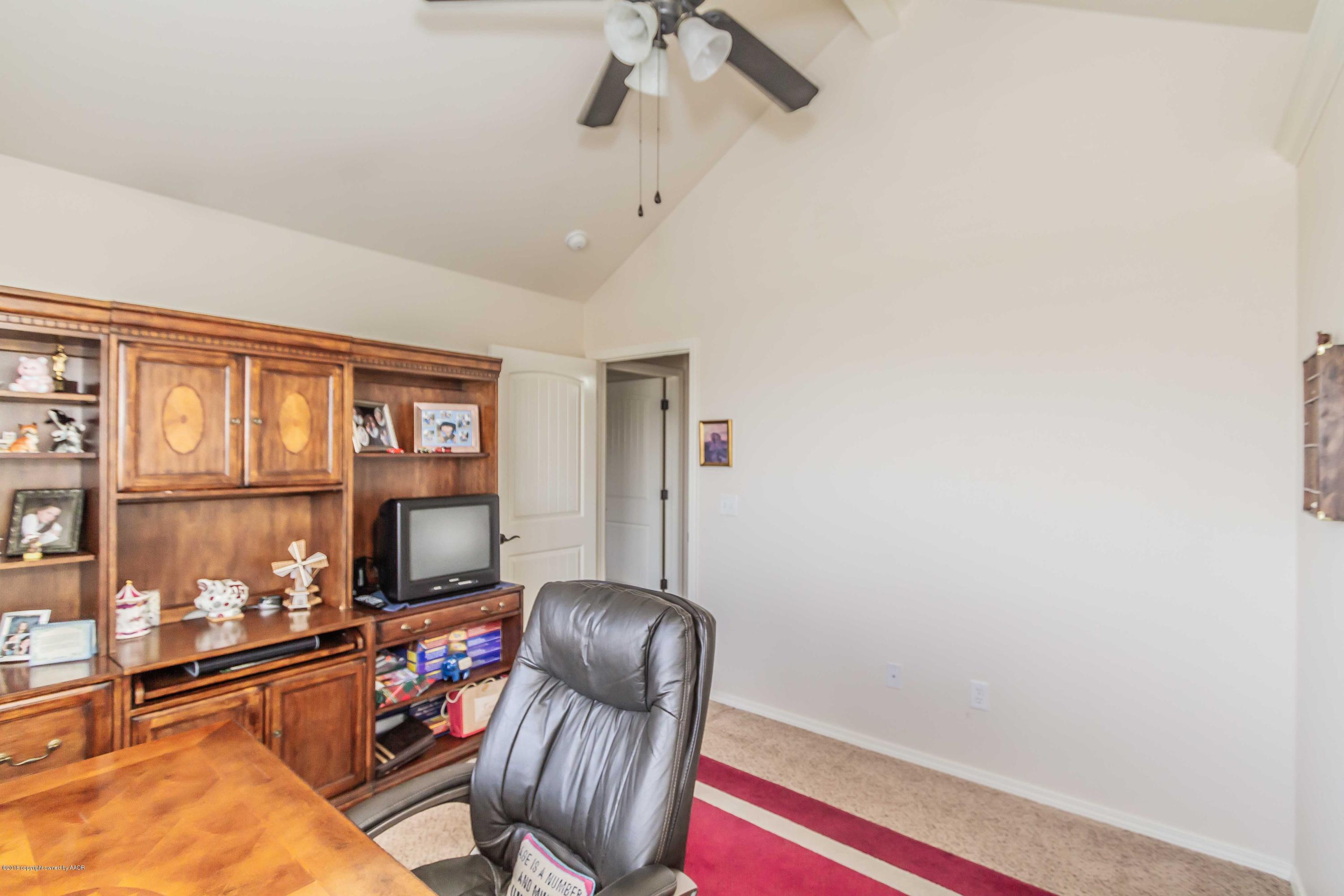 3707 Arden Road Amarillo, TX 79118 - Photo 28 of 32 a living room with furniture and a window