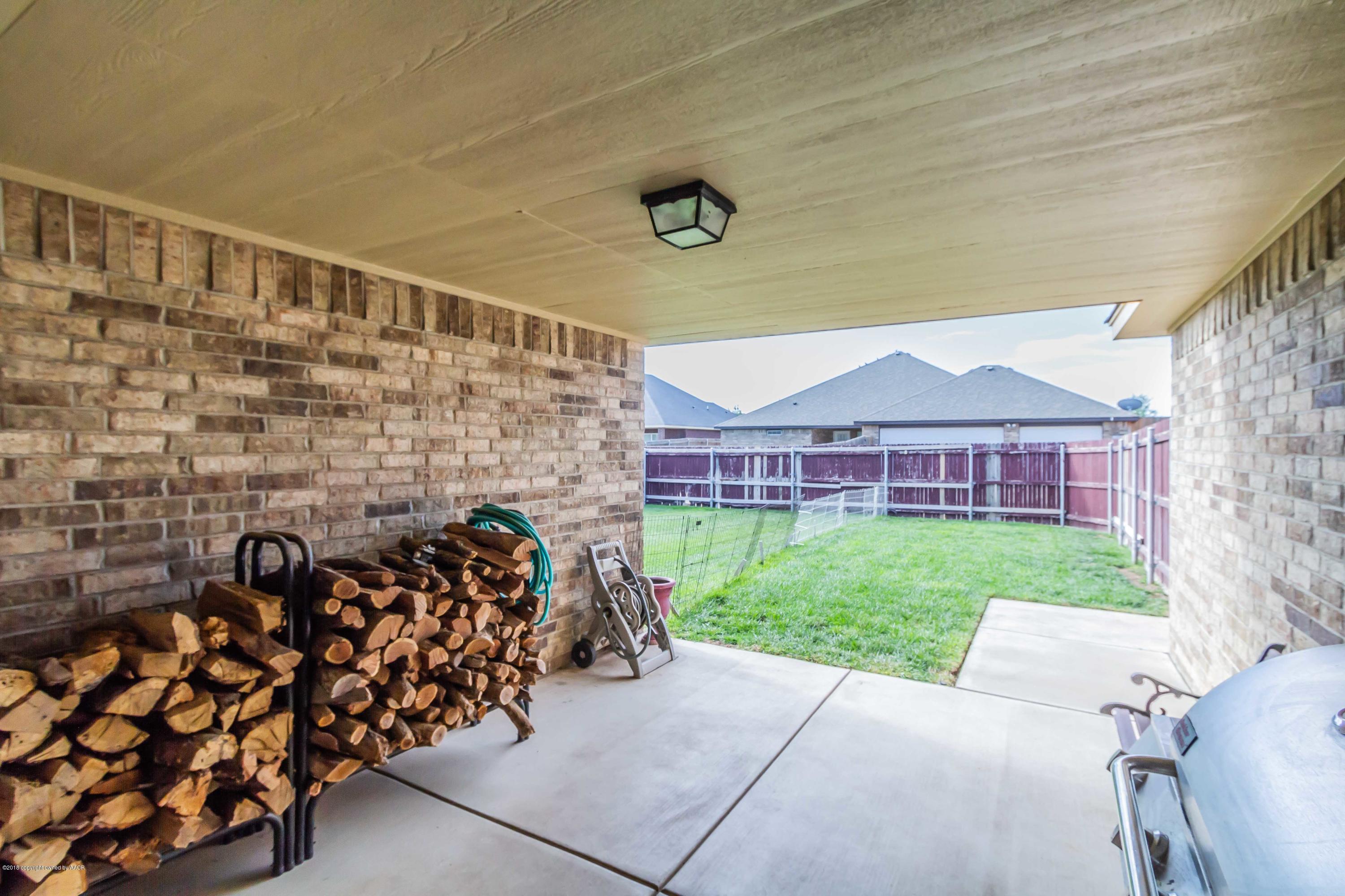 3707 Arden Road Amarillo, TX 79118 - Photo 30 of 32 a view of a porch with a bench