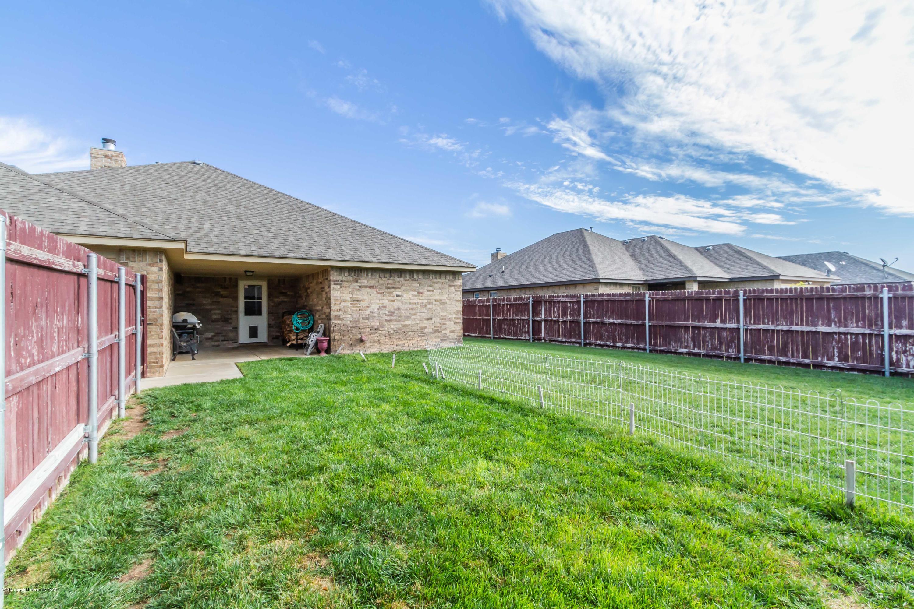 3707 Arden Road Amarillo, TX 79118 - Photo 32 of 32 a view of a house with a yard and sitting area