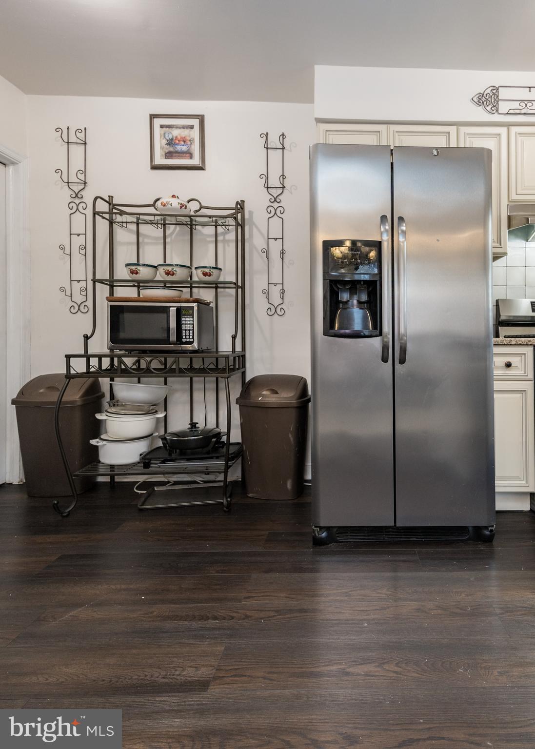 800 Disston Street Philadelphia, PA 19111 - Photo 16 of 51 a kitchen with kitchen island a counter top space and stainless steel appliances
