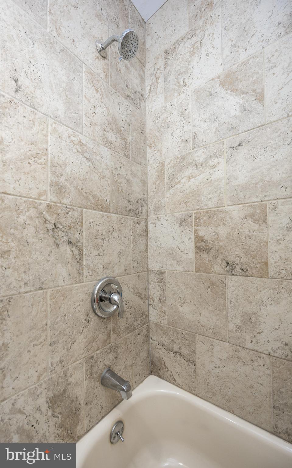 800 Disston Street Philadelphia, PA 19111 - Photo 27 of 51 a bathroom with a bathtub