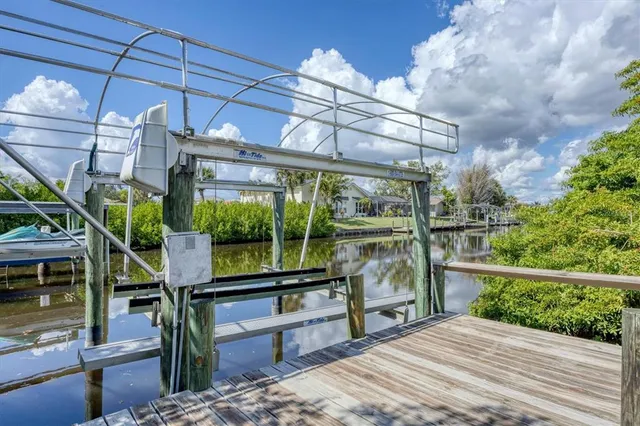 a view of a two chair and tables in the balcony