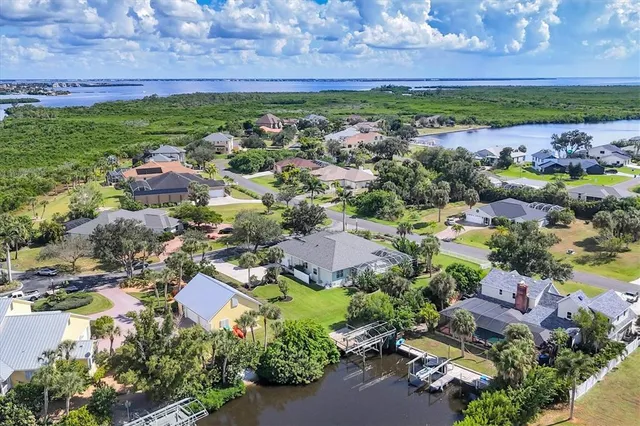 a view of a lake with a building in the background