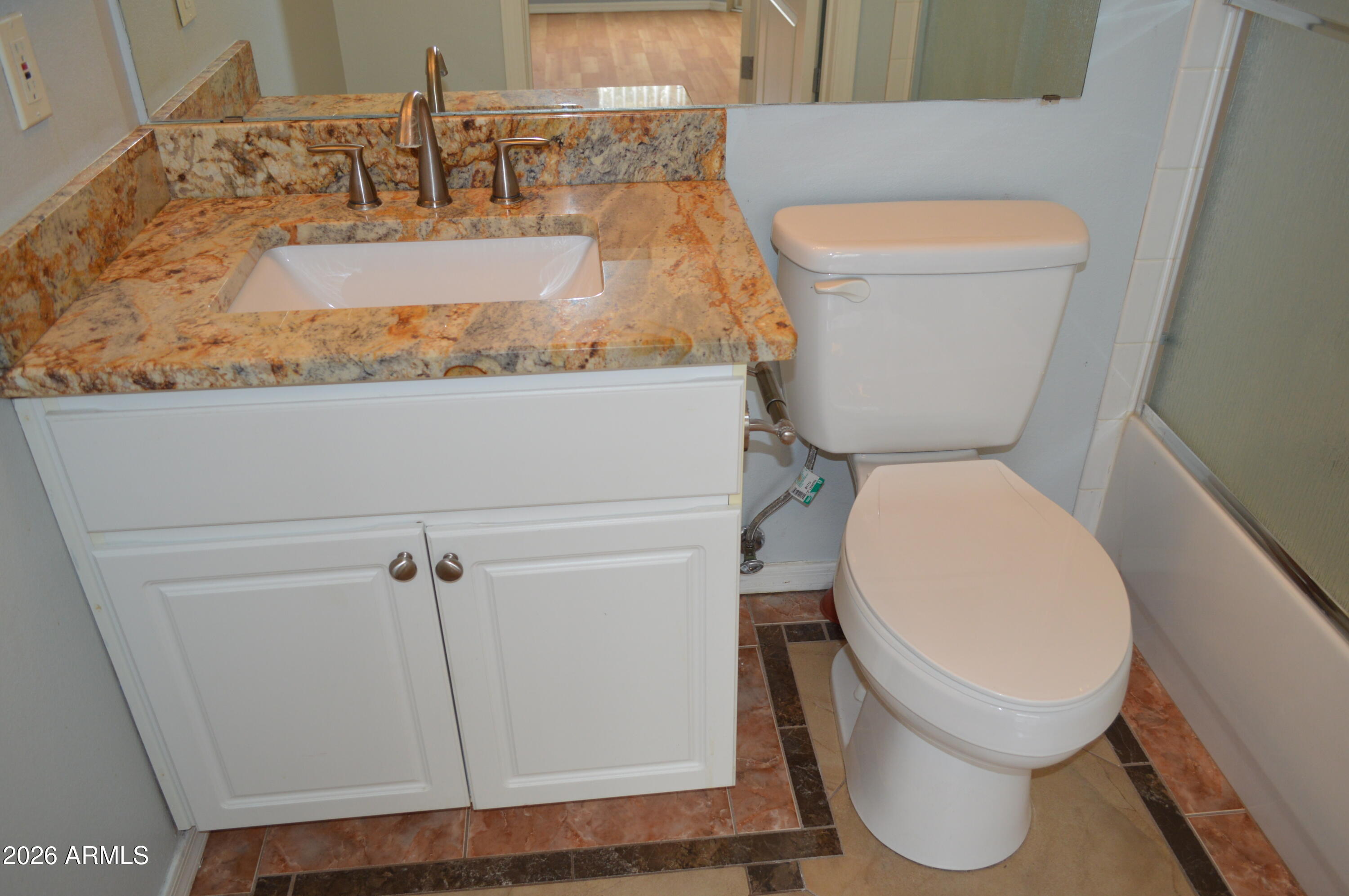 1701 East Colter Street, Unit 308 Phoenix, AZ 85016 - Photo 15 of 67 a bathroom with a toilet and a sink
