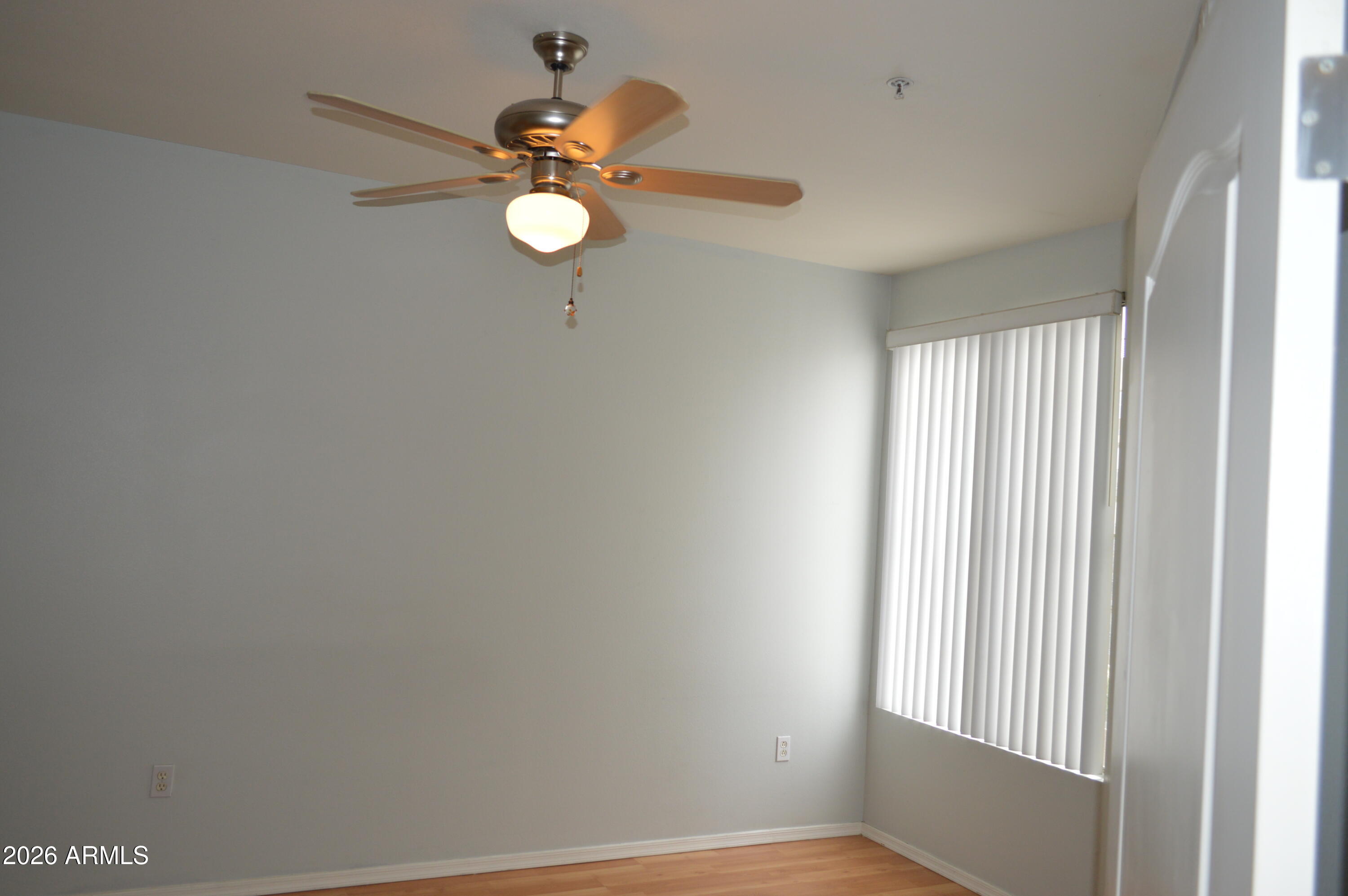 1701 East Colter Street, Unit 308 Phoenix, AZ 85016 - Photo 18 of 67 a view of a room with a window and a fan