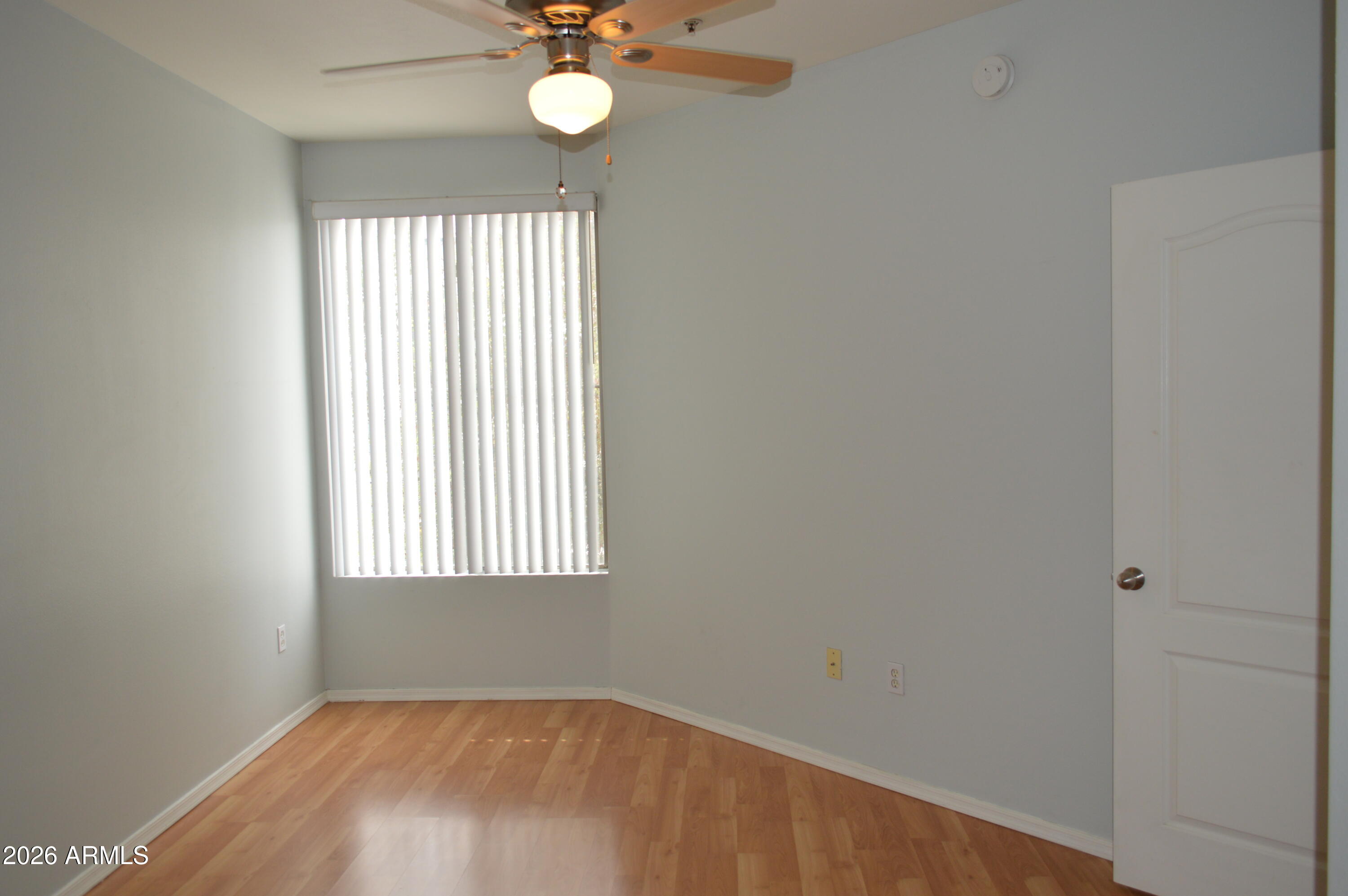 1701 East Colter Street, Unit 308 Phoenix, AZ 85016 - Photo 26 of 67 an empty room with a window