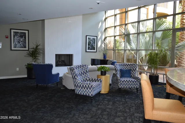a view of a swimming pool with a lounge chairs