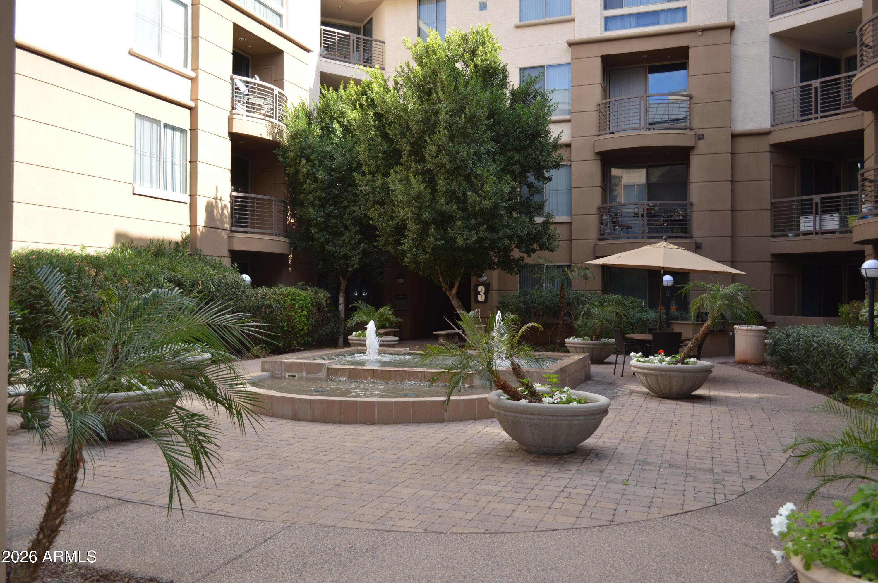 1701 East Colter Street, Unit 308 Phoenix, AZ 85016 - Photo 45 of 67 a view of a house with backyard and sitting area