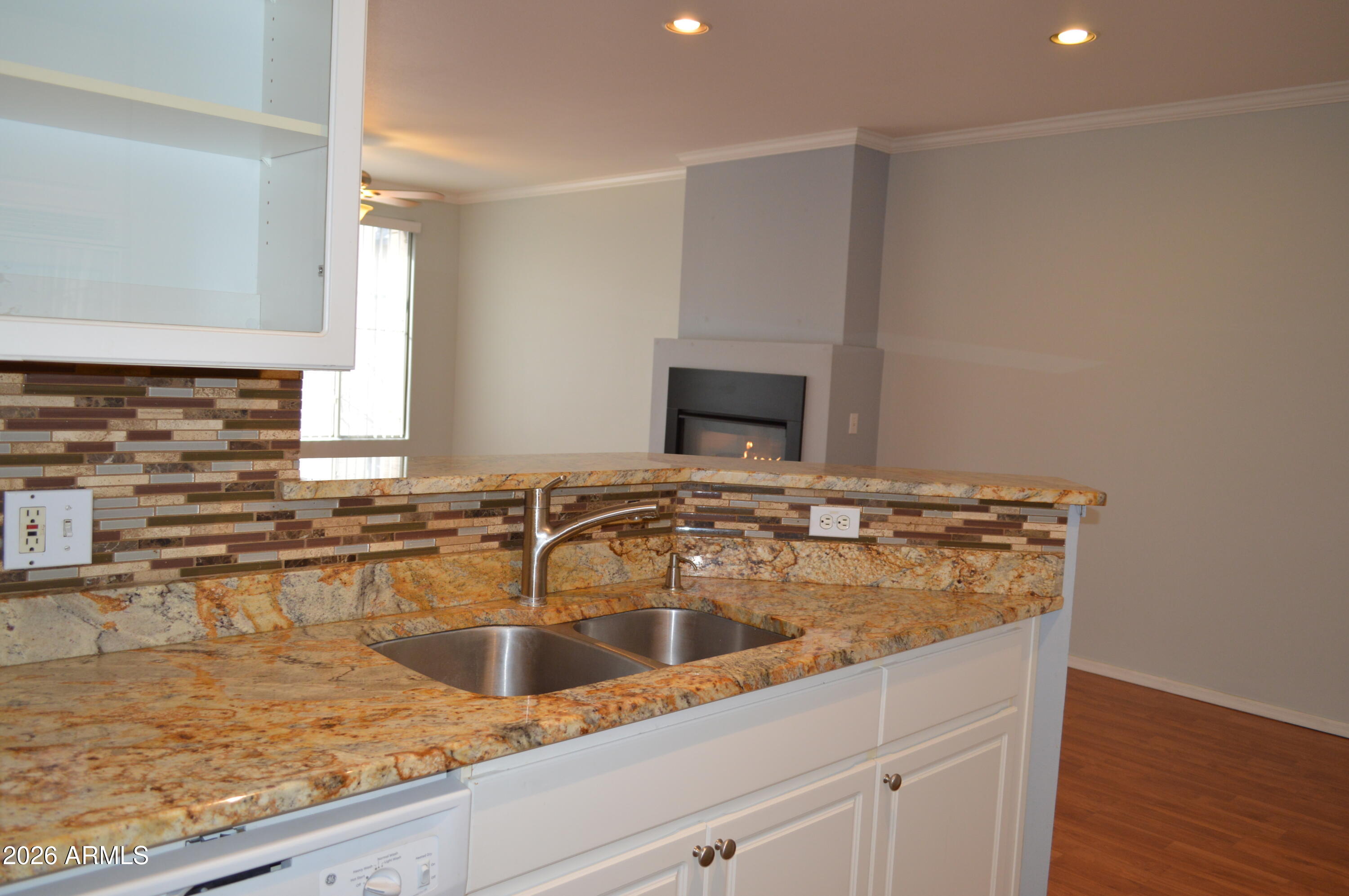 1701 East Colter Street, Unit 308 Phoenix, AZ 85016 - Photo 6 of 67 a kitchen with a sink and a stove top oven