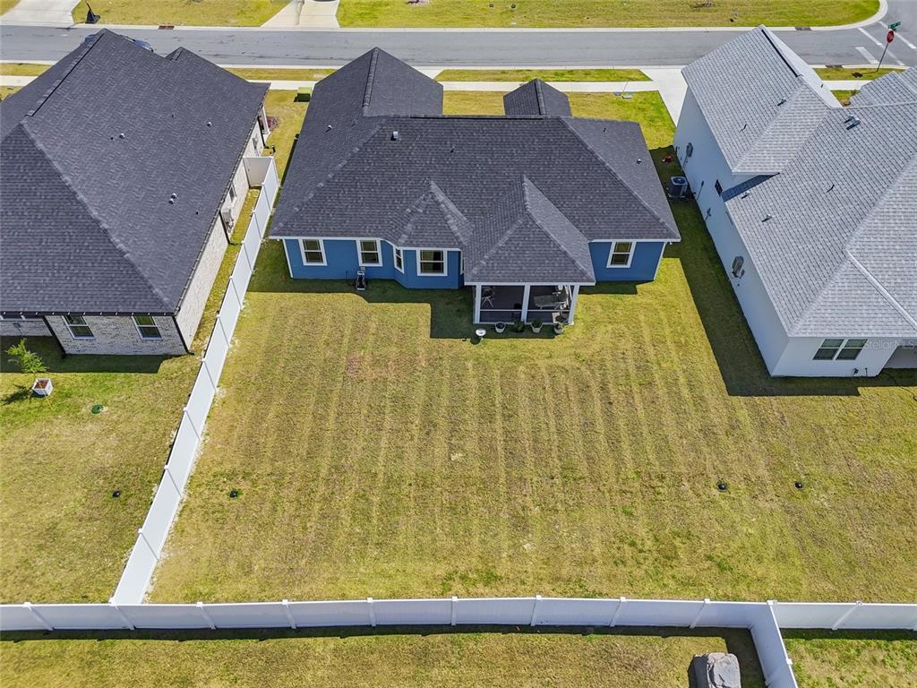 2168 Southwest 245th Terrace Newberry, FL 32669 - Photo 23 of 34 a aerial view of residential houses with swimming pool