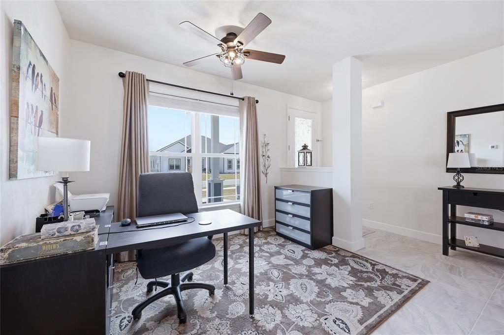 2168 Southwest 245th Terrace Newberry, FL 32669 - Photo 9 of 34 a workspace with furniture