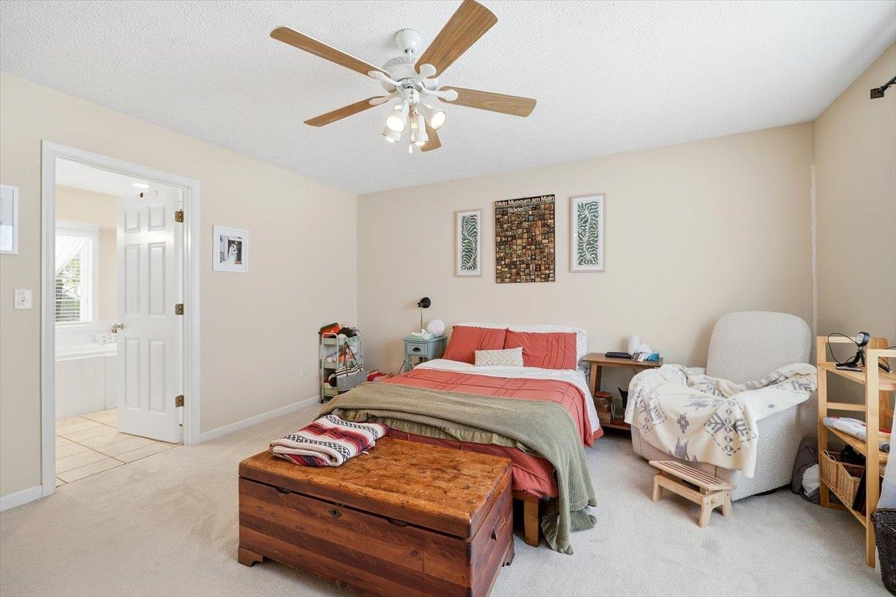 41 Long Bow Road Waynesboro, VA 22980 - Photo 19 of 45 a bedroom with a bed and a chandelier