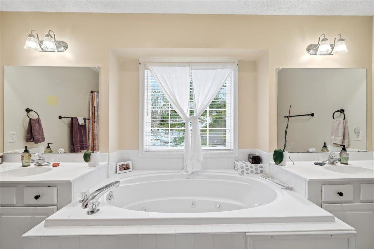 41 Long Bow Road Waynesboro, VA 22980 - Photo 21 of 45 a white bath tub sitting in a bathroom and sink