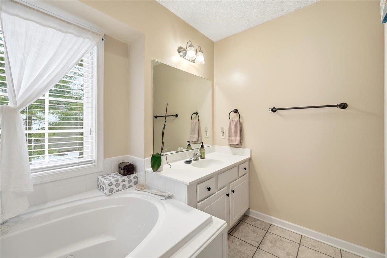 41 Long Bow Road Waynesboro, VA 22980 - Photo 23 of 45 a bathroom with a tub sink and mirror