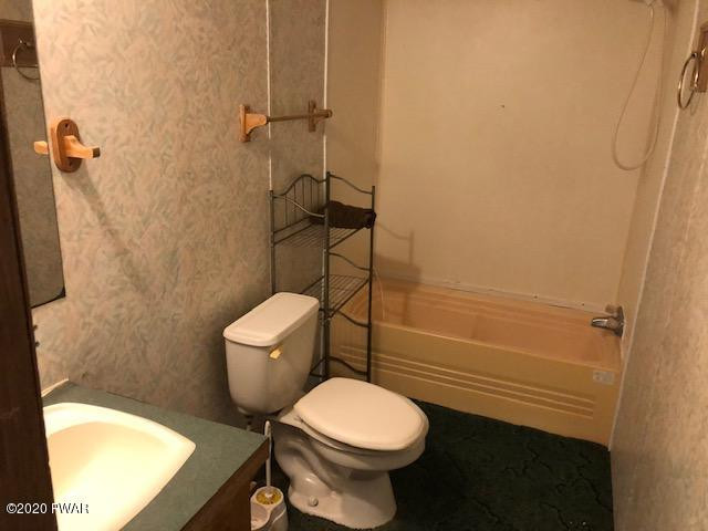 213 Slish Road Honesdale, PA 18431 - Photo 12 of 13 a bathroom with a toilet and a shower