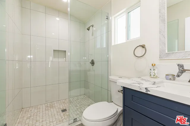 a view of a hallway with a white walls