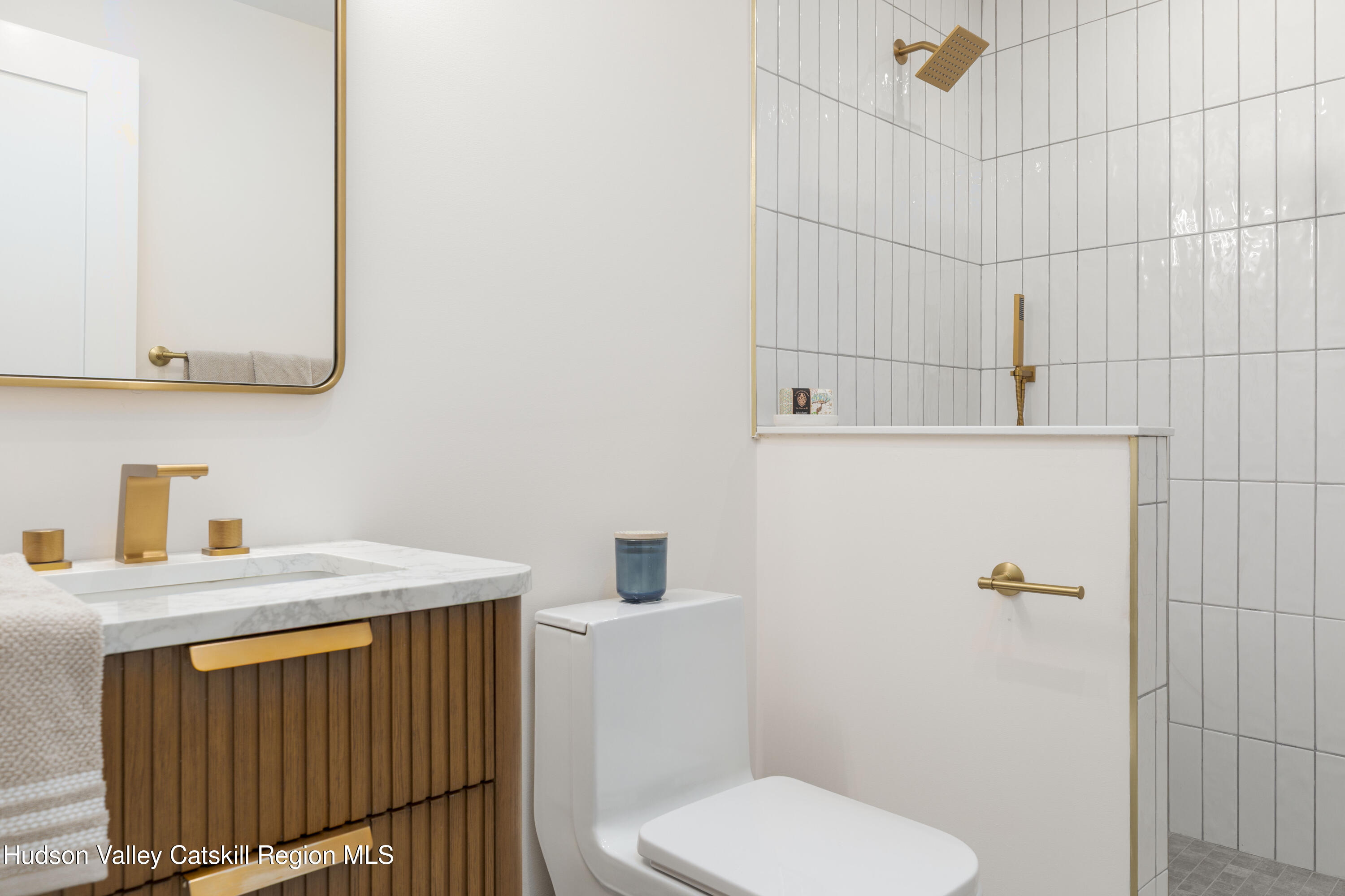 119 Mt Laurel Road Kerhonkson, NY 12446 - Photo 19 of 37 a bathroom with a sink a toilet and mirror