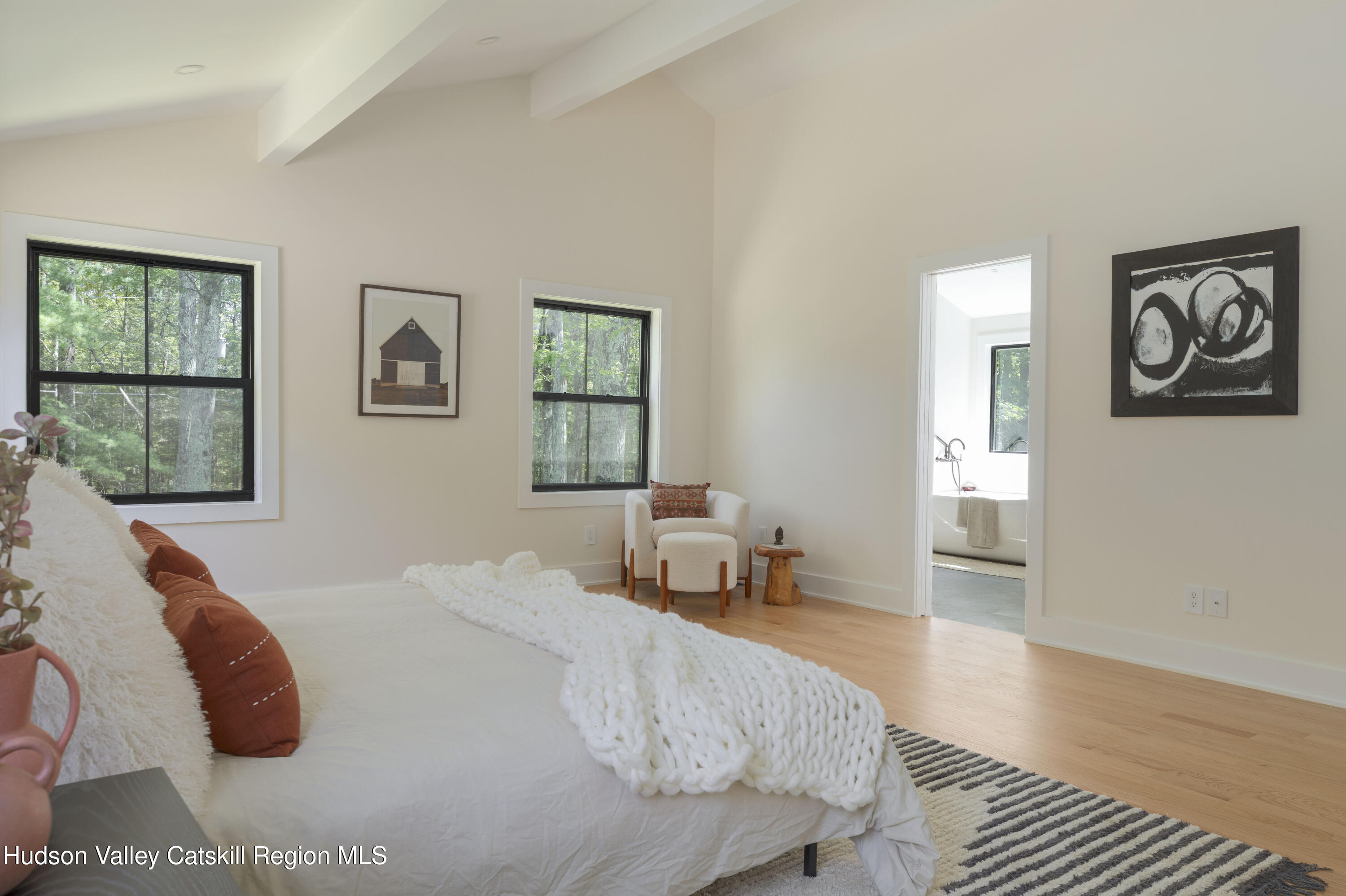 119 Mt Laurel Road Kerhonkson, NY 12446 - Photo 23 of 37 a bedroom with a bed and wooden floor