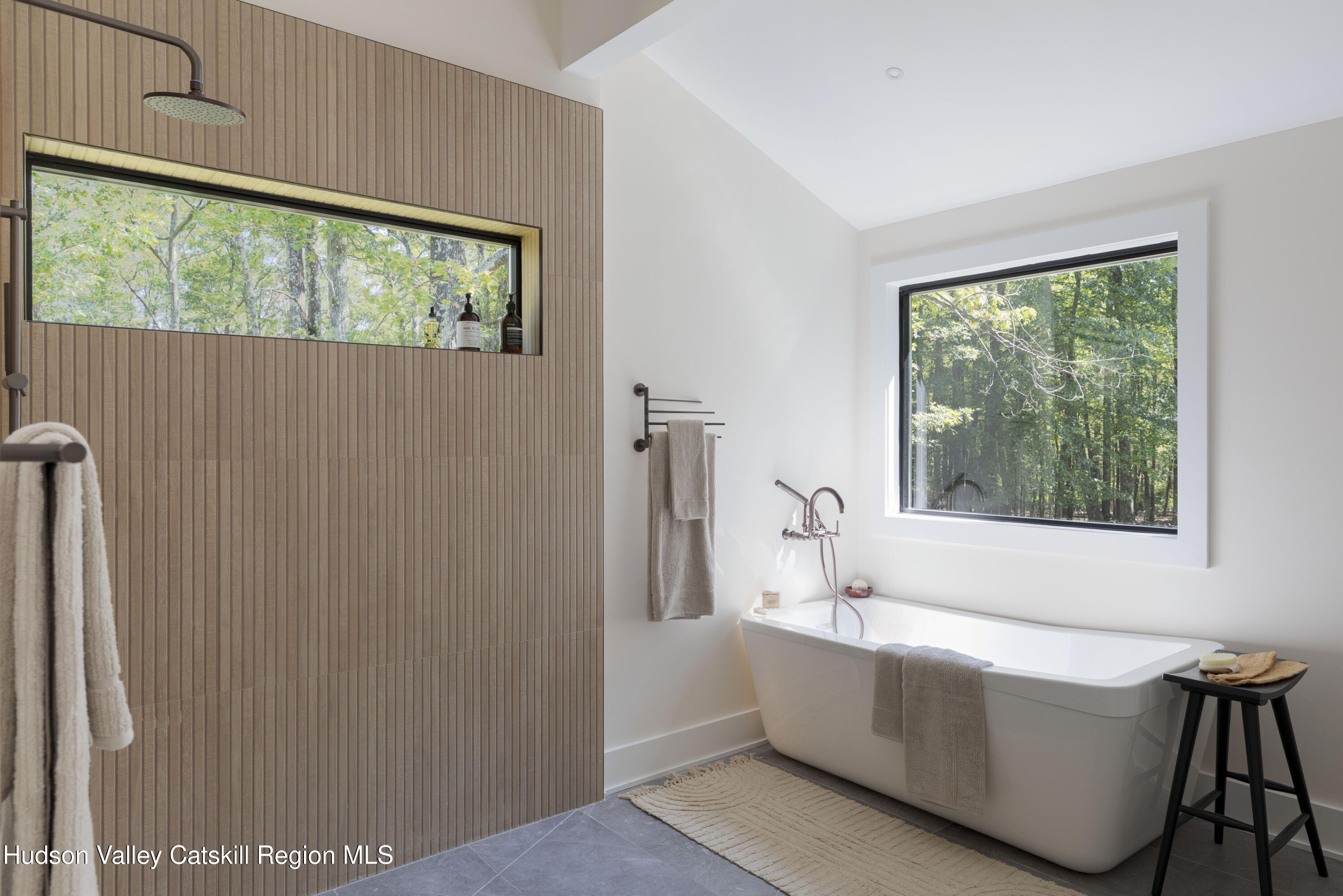119 Mt Laurel Road Kerhonkson, NY 12446 - Photo 24 of 37 a bathroom with a bathtub and window