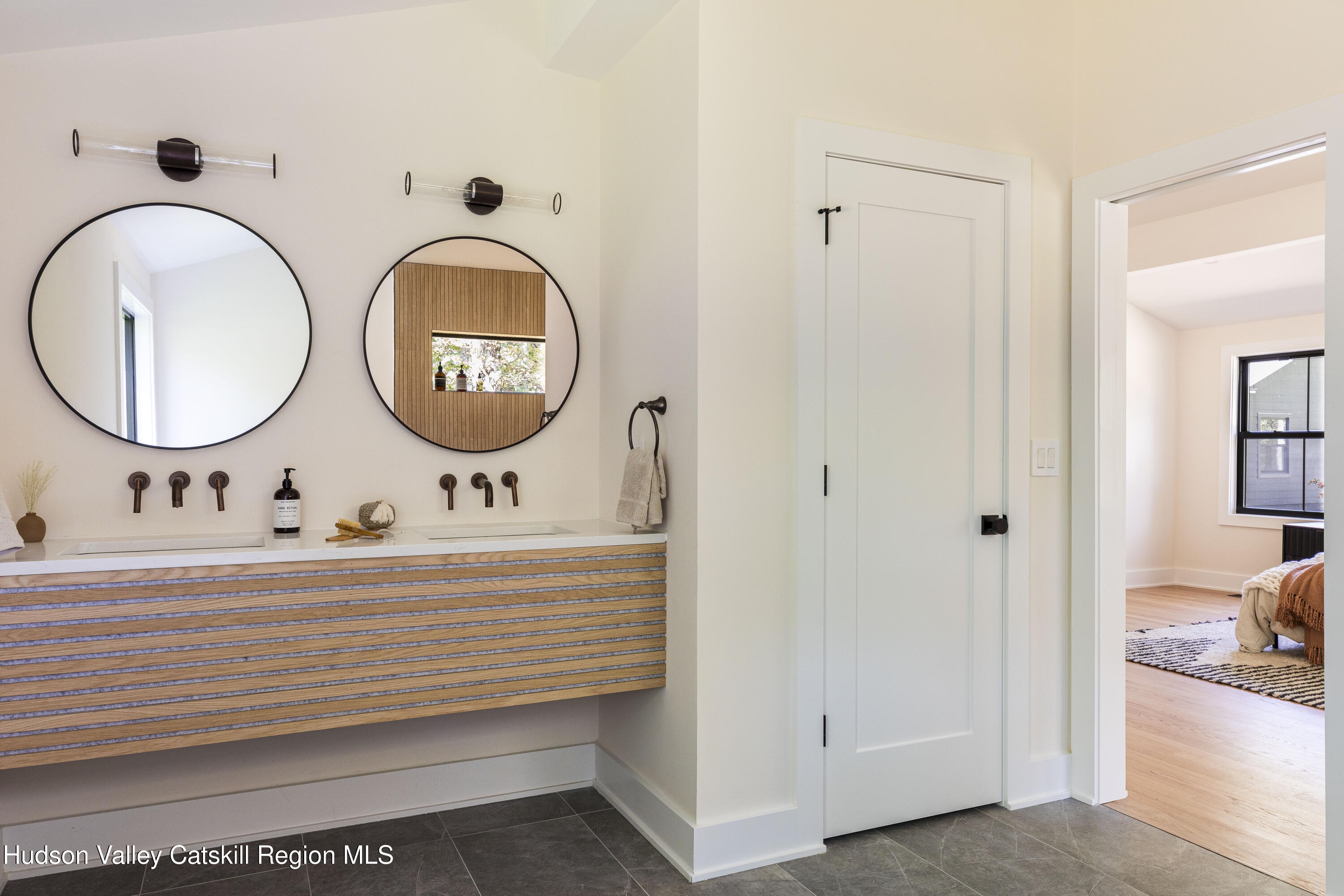 119 Mt Laurel Road Kerhonkson, NY 12446 - Photo 25 of 37 a bathroom with a sink and a mirror