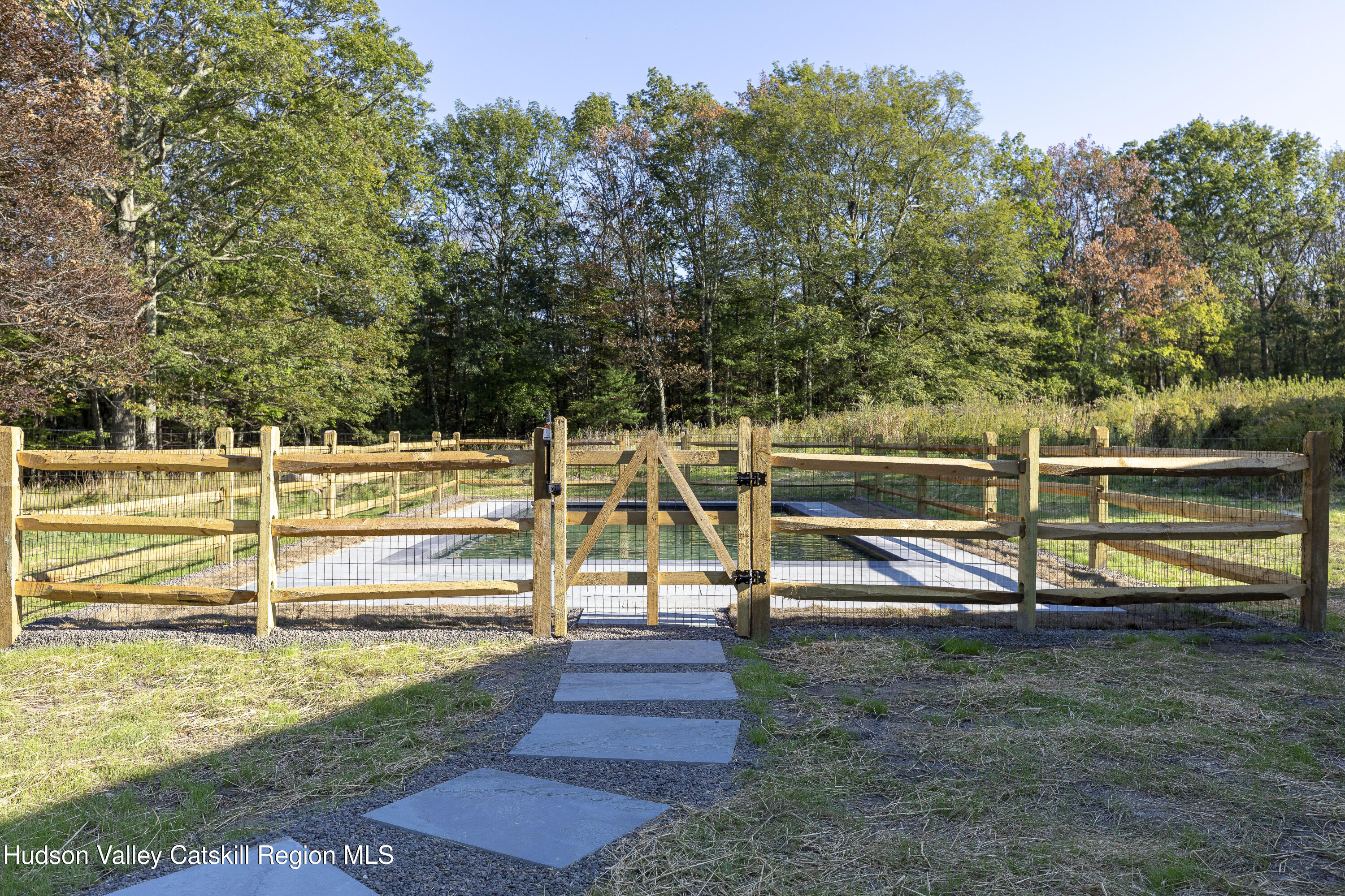 119 Mt Laurel Road Kerhonkson, NY 12446 - Photo 32 of 37 a view of a park with lounge chairs